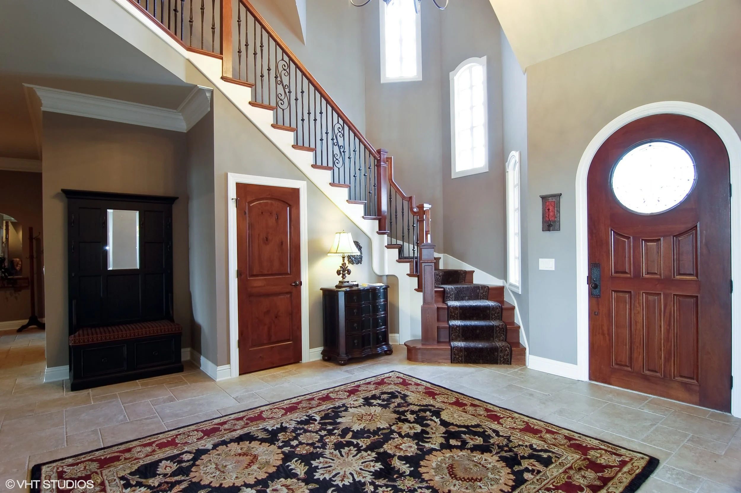 Naperville Foyer Remodel with New Stair Case in this Naperville Custom Home Renovation. Looking to Update Your Foyer in Naperville?
