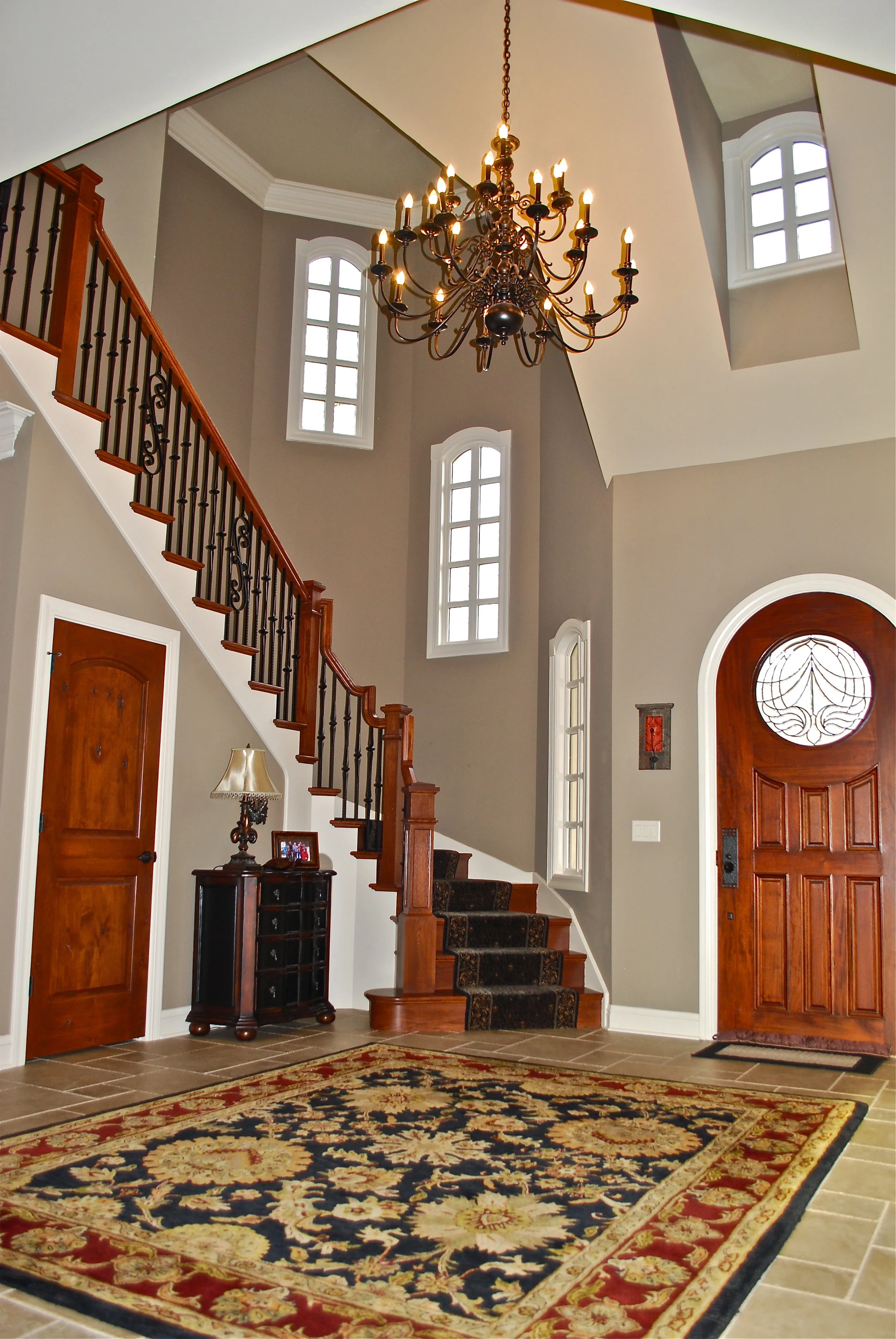 The Foyer Chandelier was Painted Oil Rubbed Bronze to Save Money. It Was Solid Bronze$$$