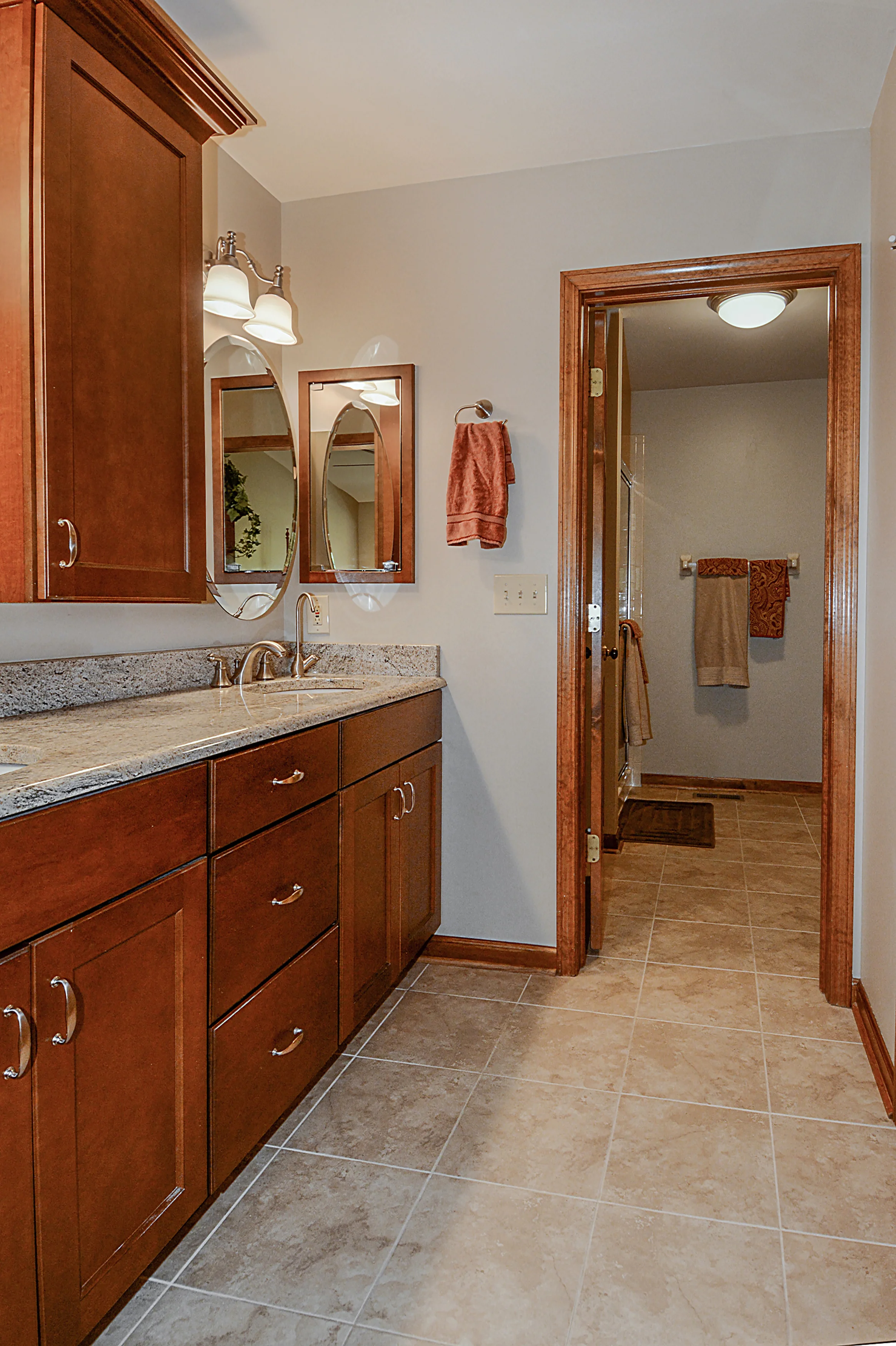 New Tile Floors in this Naperville IL End Unit Townhome Bathroom Remodel. New Trim &amp; Double Bowl Vanity Also. Naperville IL. Townhome Remodeling &amp; Updating.