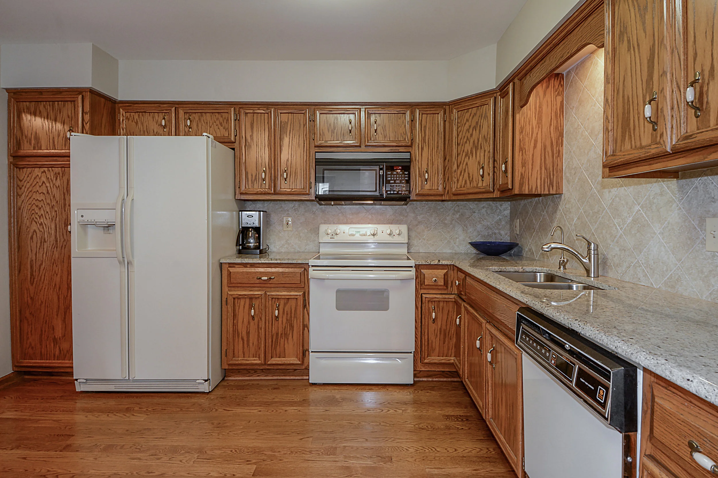 Naperville IL. Townhome Kitchen Updating with Granite &amp; New Backsplash. New Hardwood Flooring &amp; Faucet. Looking to Update Your Townhome Before You List for Sale? Call Southampton