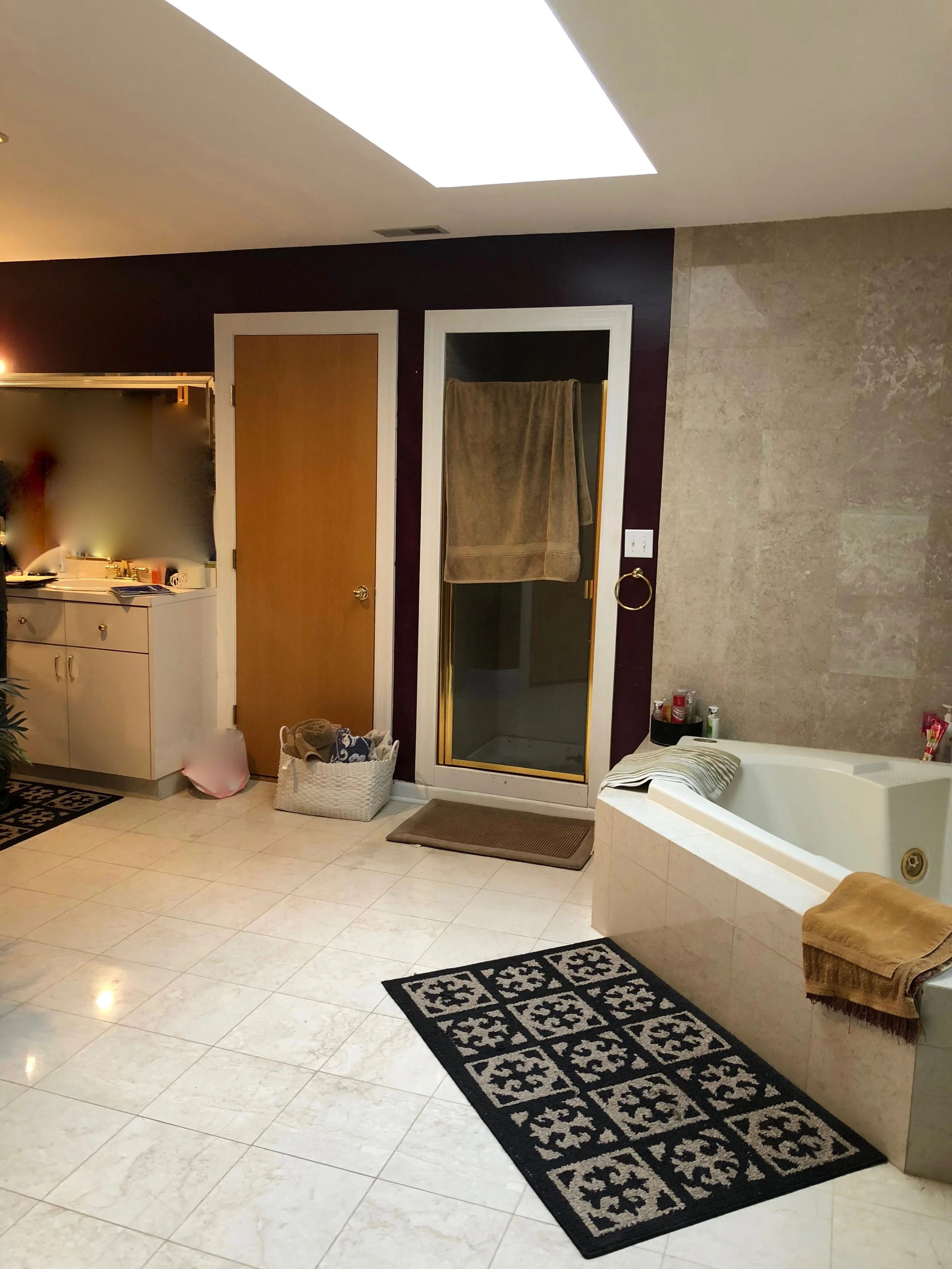 Bathroom Remodel Before Photo with Corner Tub and Small Fiberglass Enclosure Shower in this Oversized Room- Geneva IL