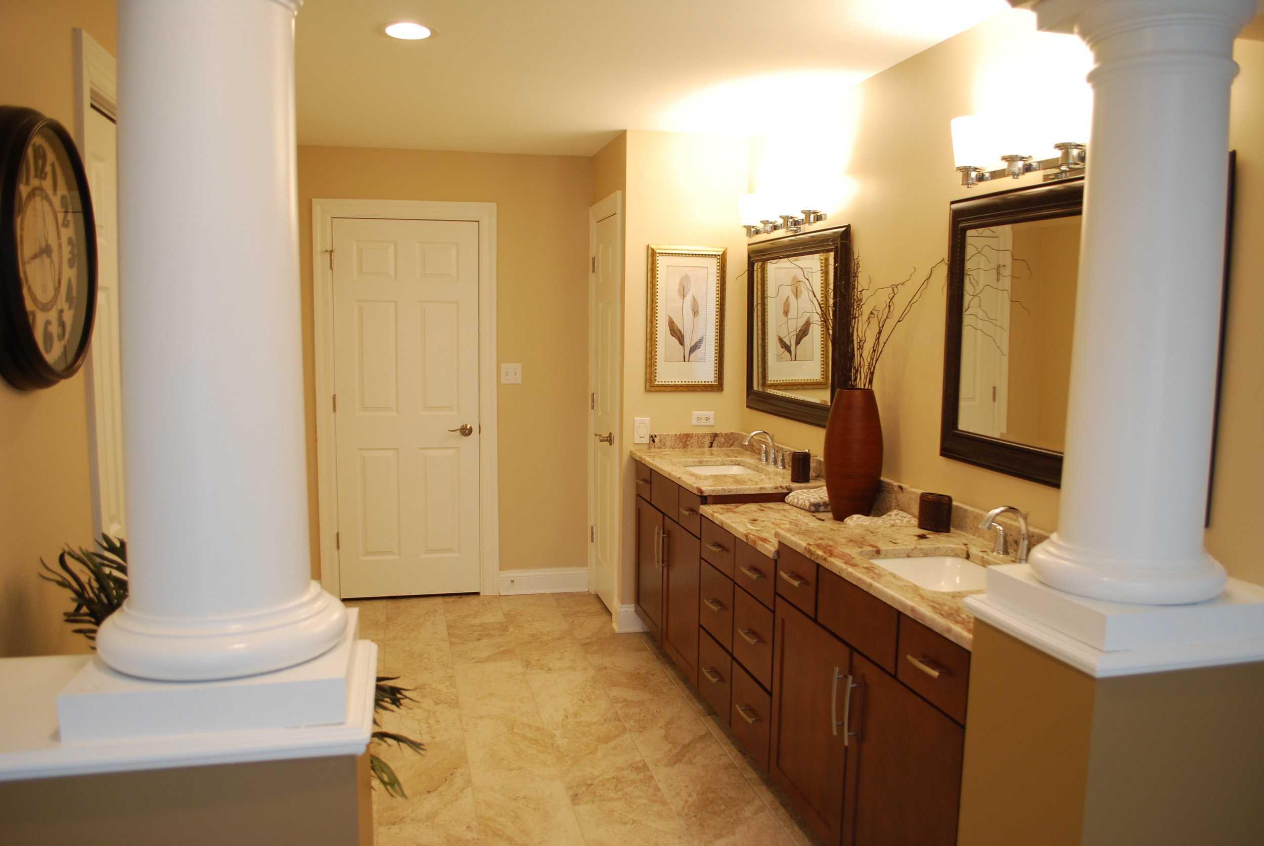 Pillars in Bathroom to Separate Vanity Sinks and Shower