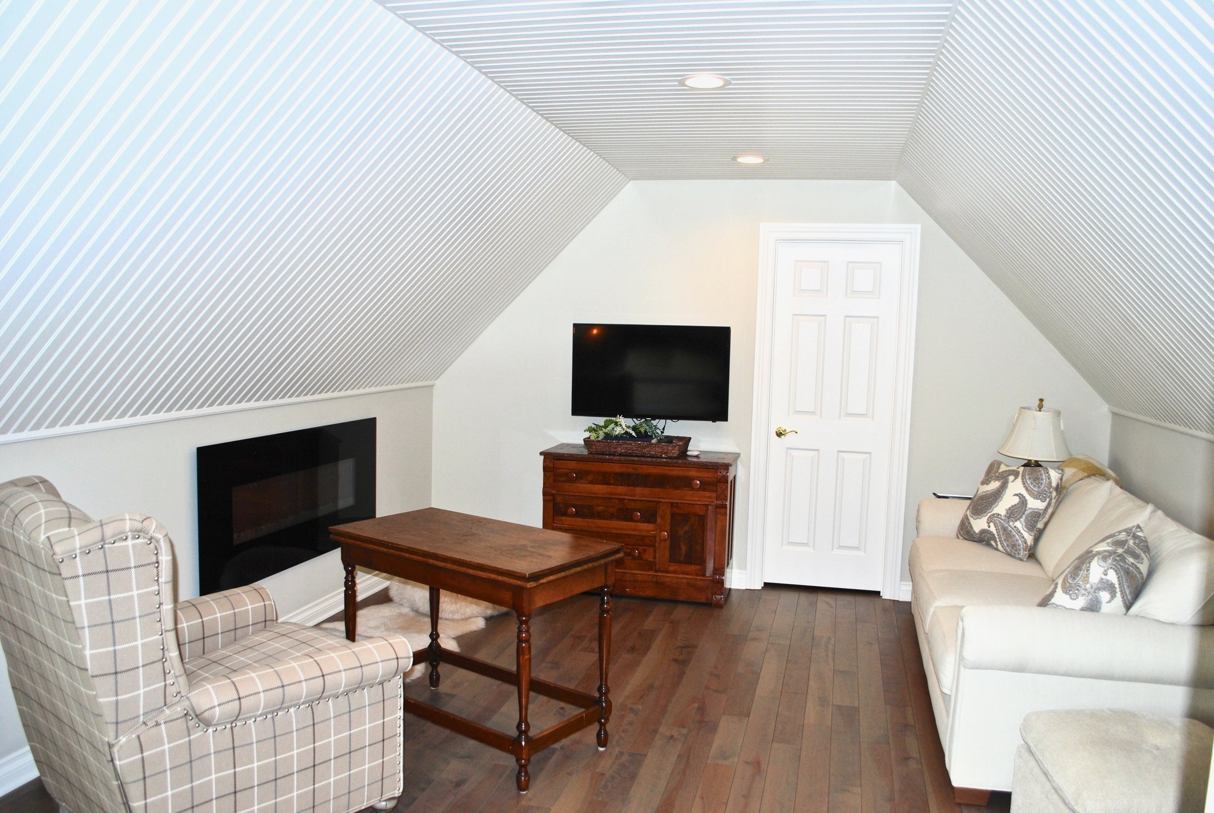 Family Room in Attic Remodel for Out of Town Guests .jpg