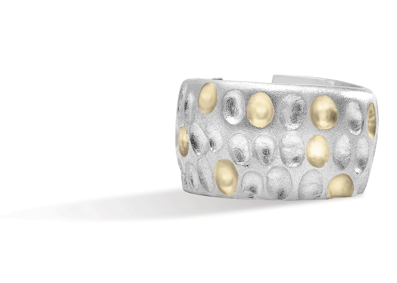 DIMPLE RING | Free form silver ring with sandblasted finish, and 10 karat yellow gold burnished accents for contrast.