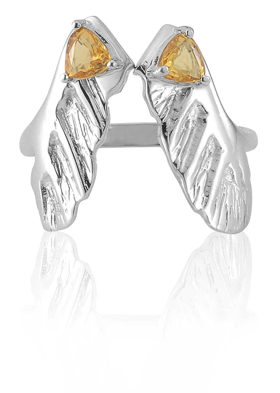 SAMARA RING | Certified 10 karat white gold open ring modelled after the helicopter-like seed of the Aver Pseudoplatanus (sycamore maple), with two semi-flush/prong set natural trillion cut sapphires.