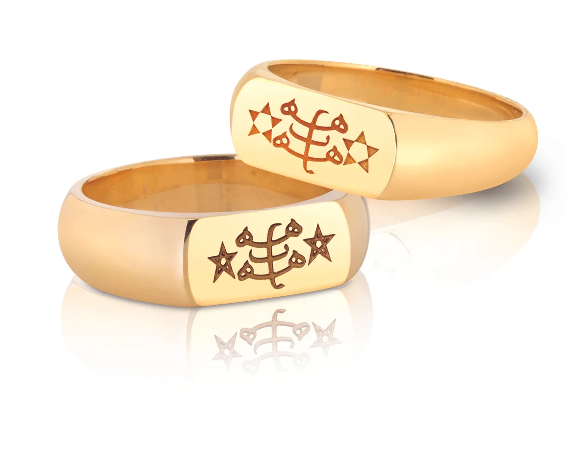 WEDDING BANDS | 10 karat and 14 karat yellow gold bands with laser engraved Ringstone Symbol