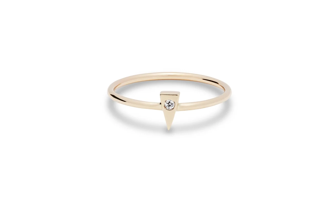 MODERN RING | 10 karat yellow gold with a flush set natural 1.5mm diamond