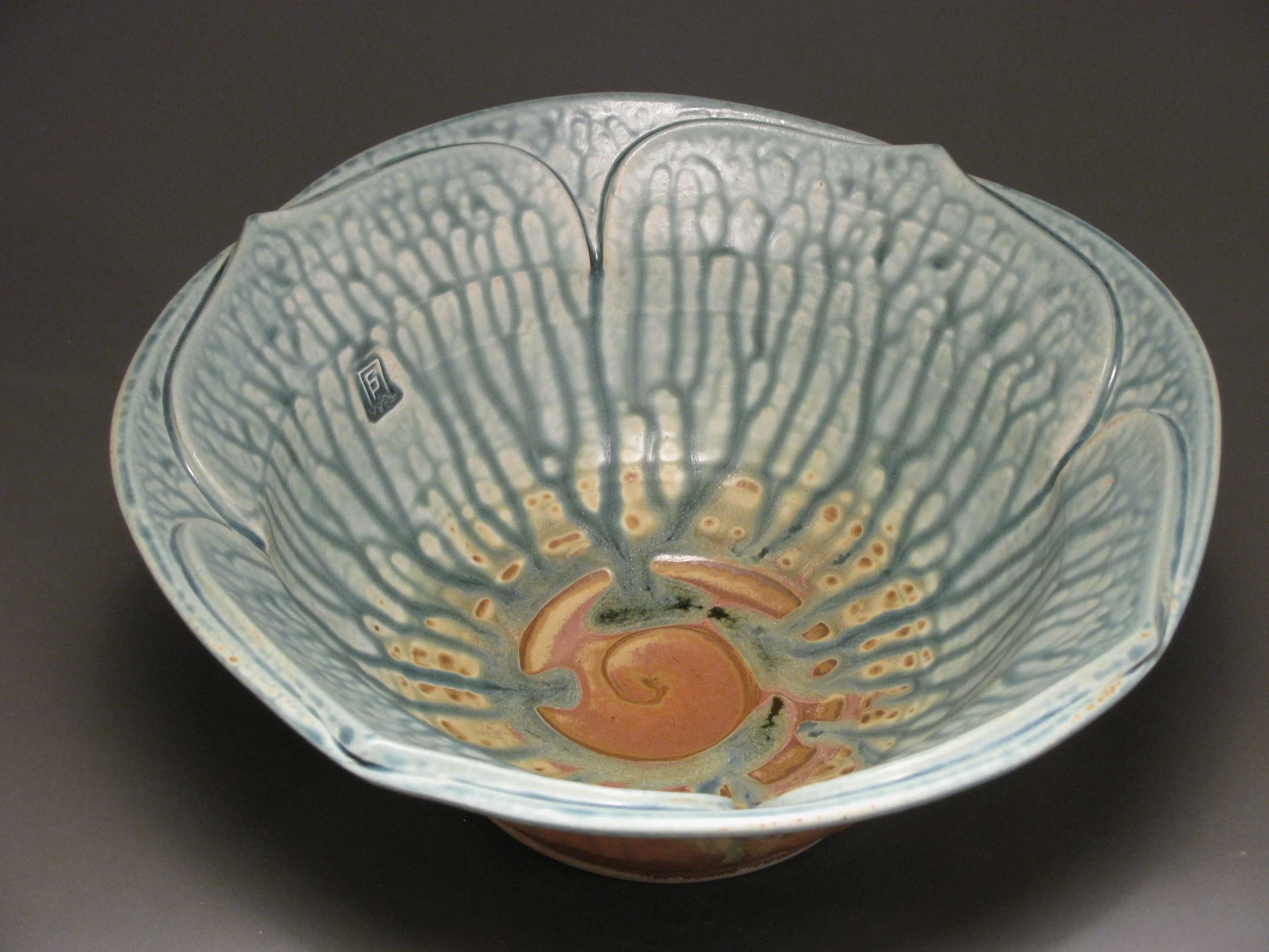 Lotus serving bowl Glazes: blue ash and matte rust