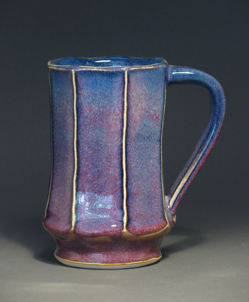 Facetted mug 5.5" tall Glazes: purple haze and copper red