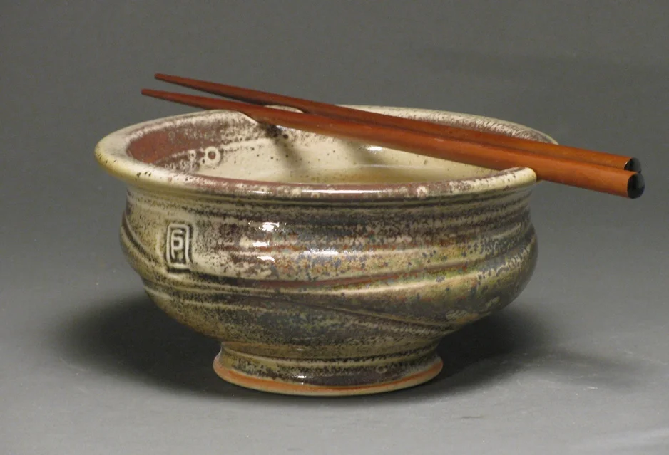 Noodle bowl 6" diameter Glazes: white shino and Rob's green