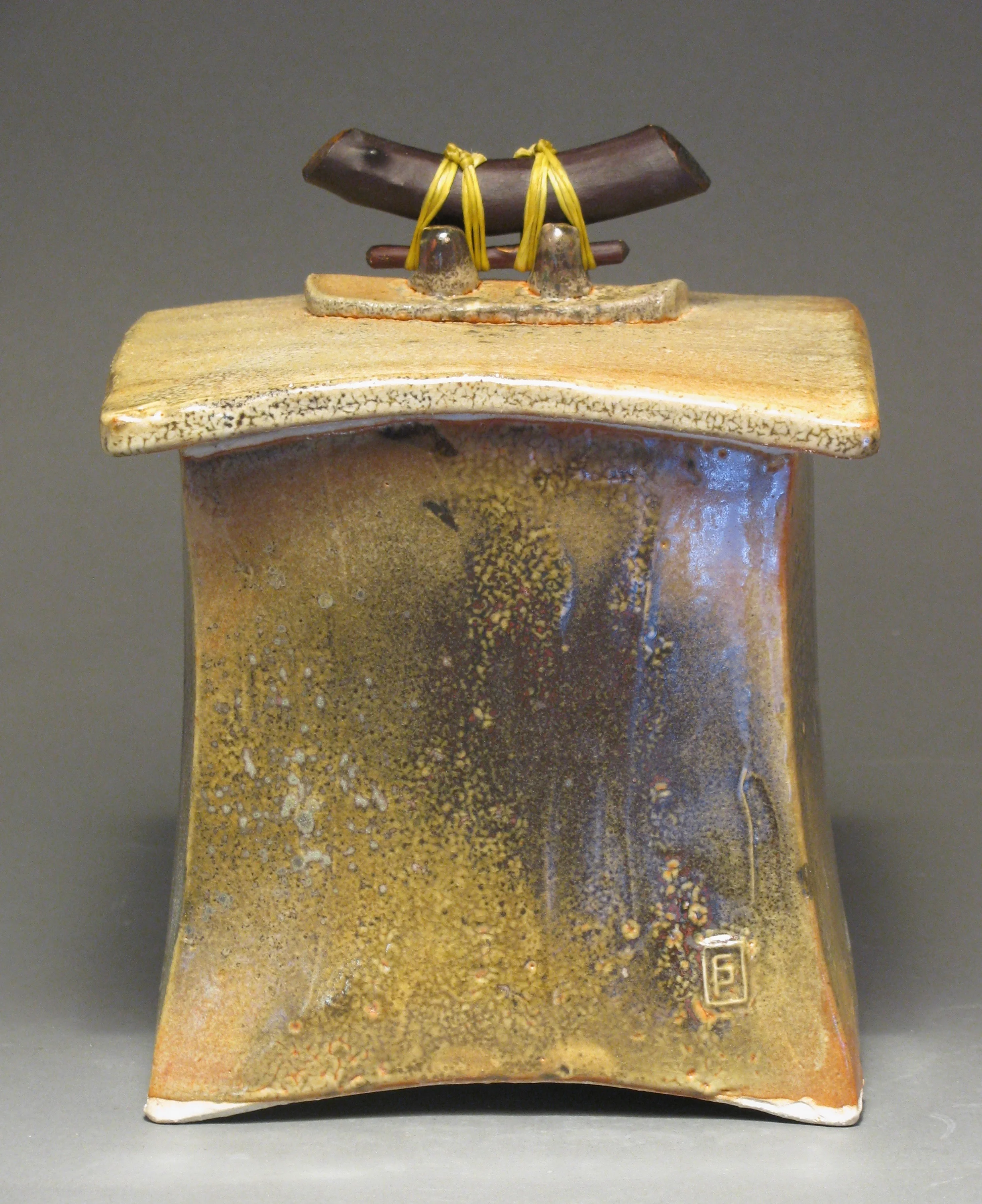 Lidded box 8" tall by 6 1/2" wide by 6 1/2" deep Glaze: Davis shino