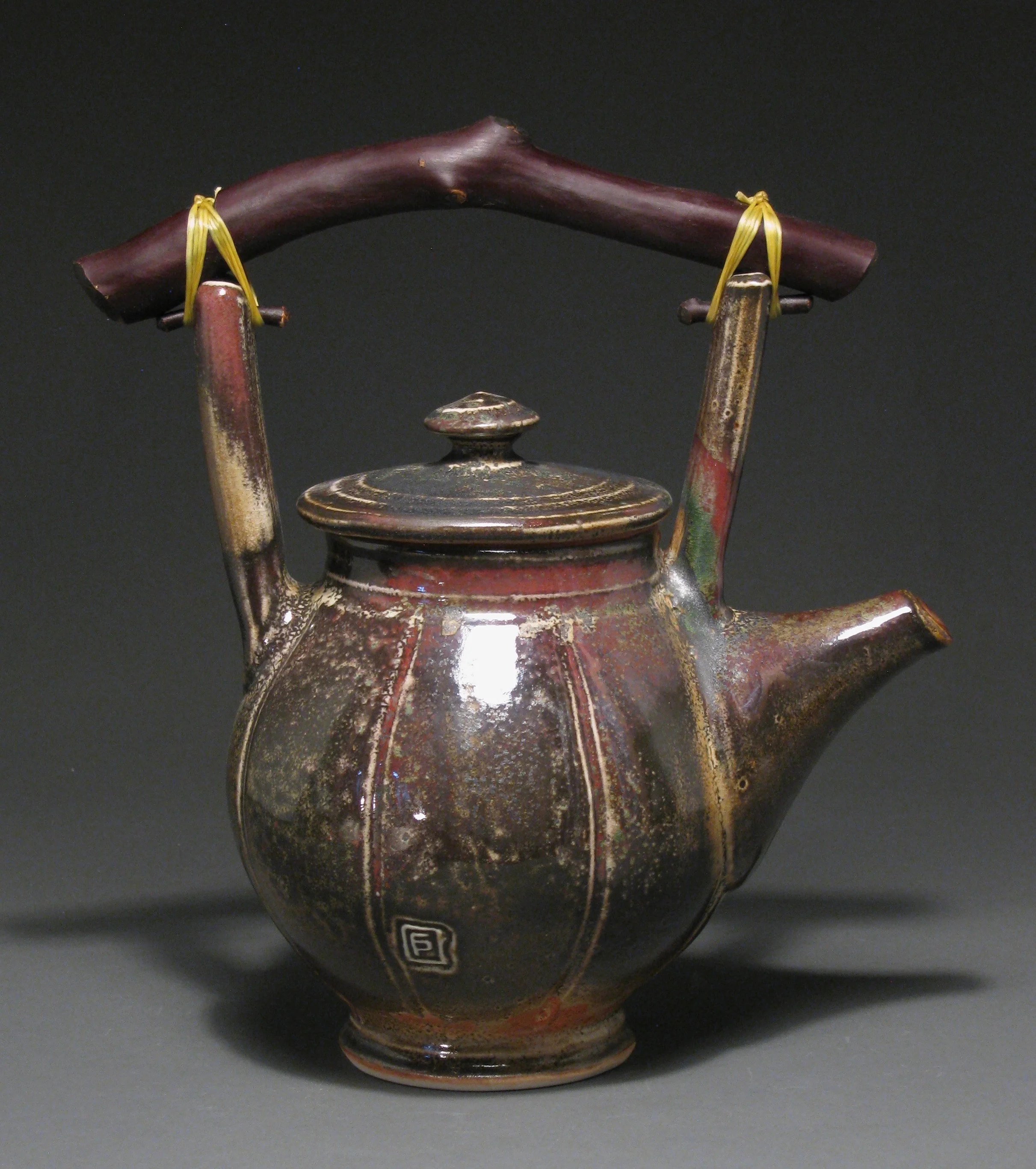 Teapot 10” tall Glazes: Davis shino with Rob’s green