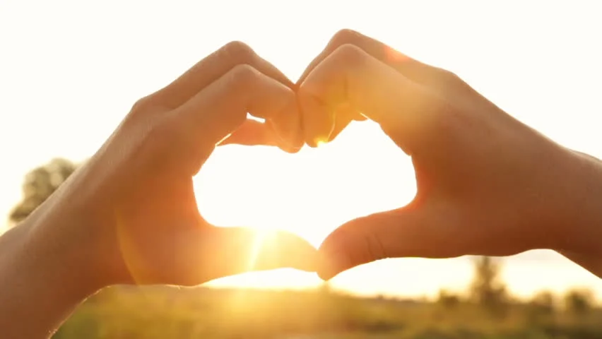 handsformingheartwithsun.jpg
