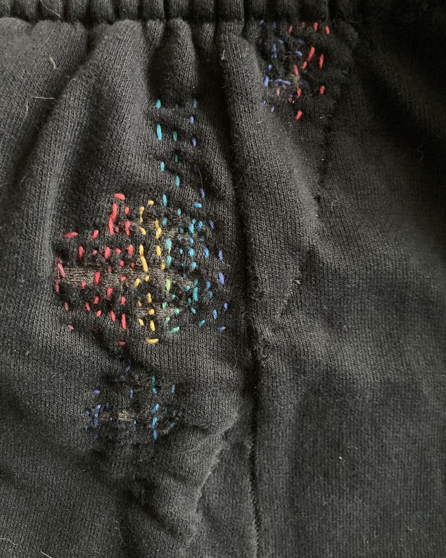 Just popping in to show a very humble mend, my son&rsquo;s holey joggers that desperately needed patching. (Lest someone ask, I have no idea how these holes appeared where they did!) I took inspiration from @bookhou &lsquo;s inspiring backstitching a