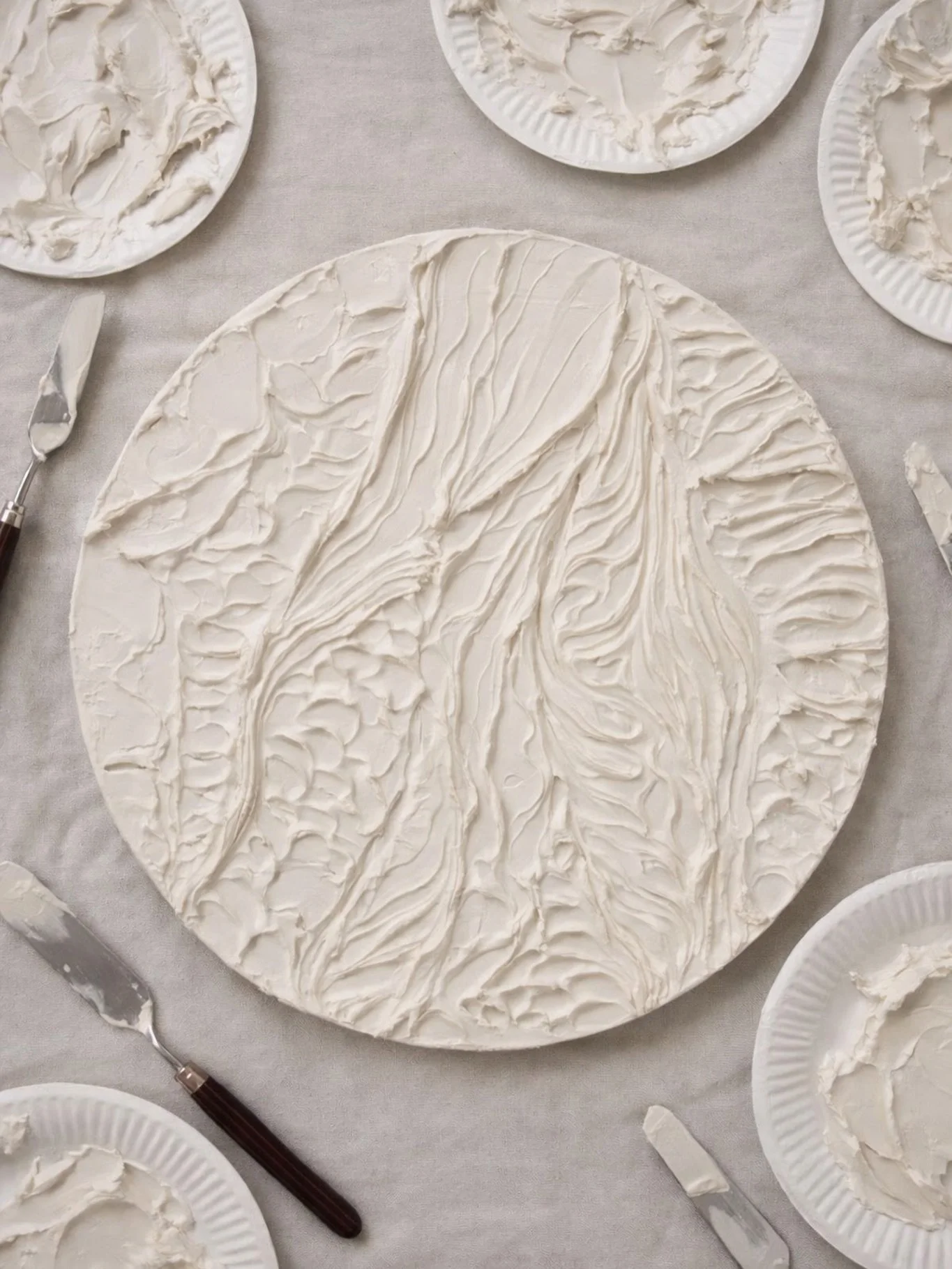 Feel your way back to calm.

This year at Camp Minted I introduced a new creative experience called Grounded in Texture &mdash; a meditative, tactile art practice where creativity begins not with color or image, but with touch.

Using plaster, wood p