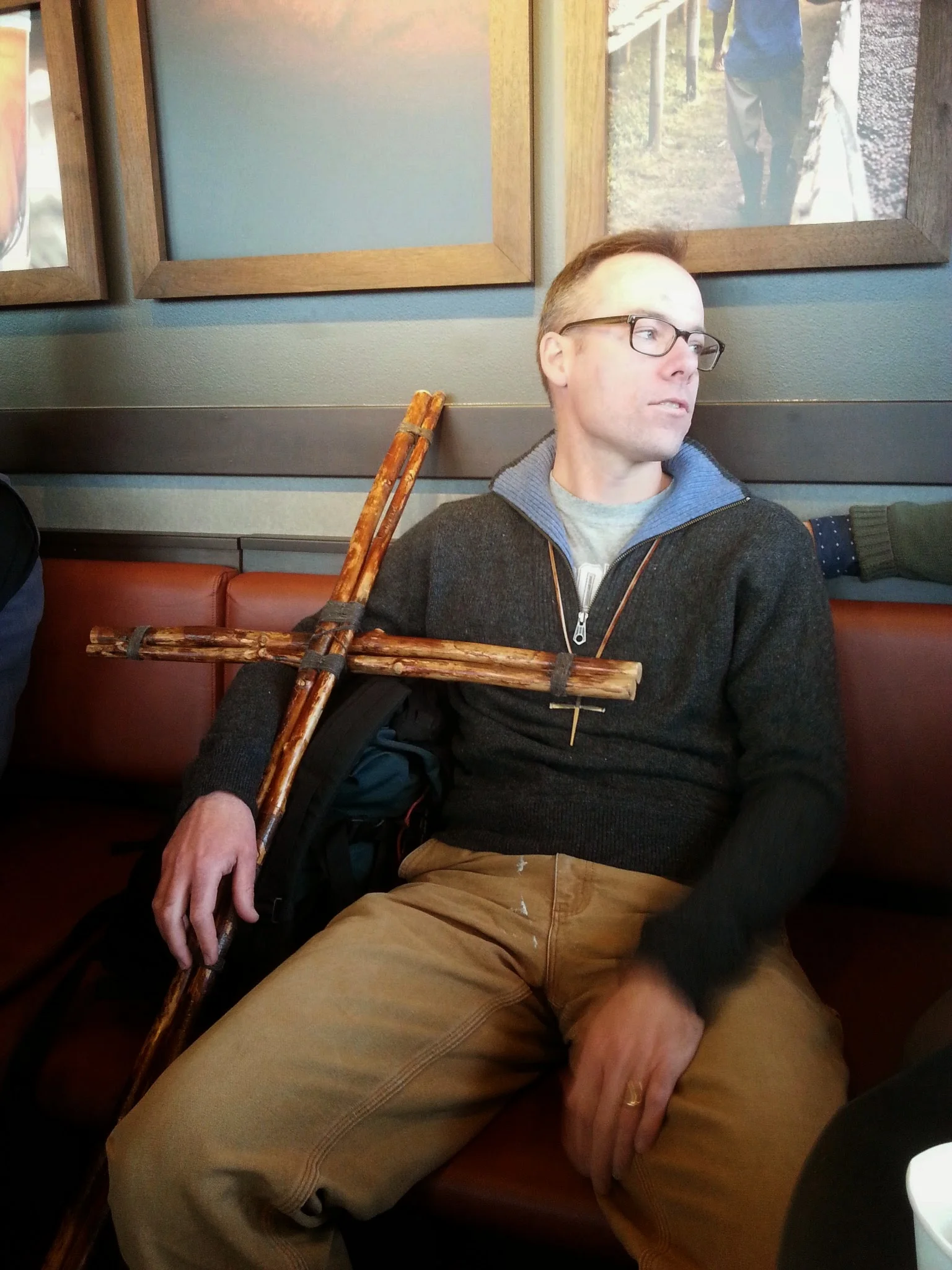 The cross resting on Ken's shoulder has traveled over a hundred miles for the hundred plus years of Manitou's existence. 