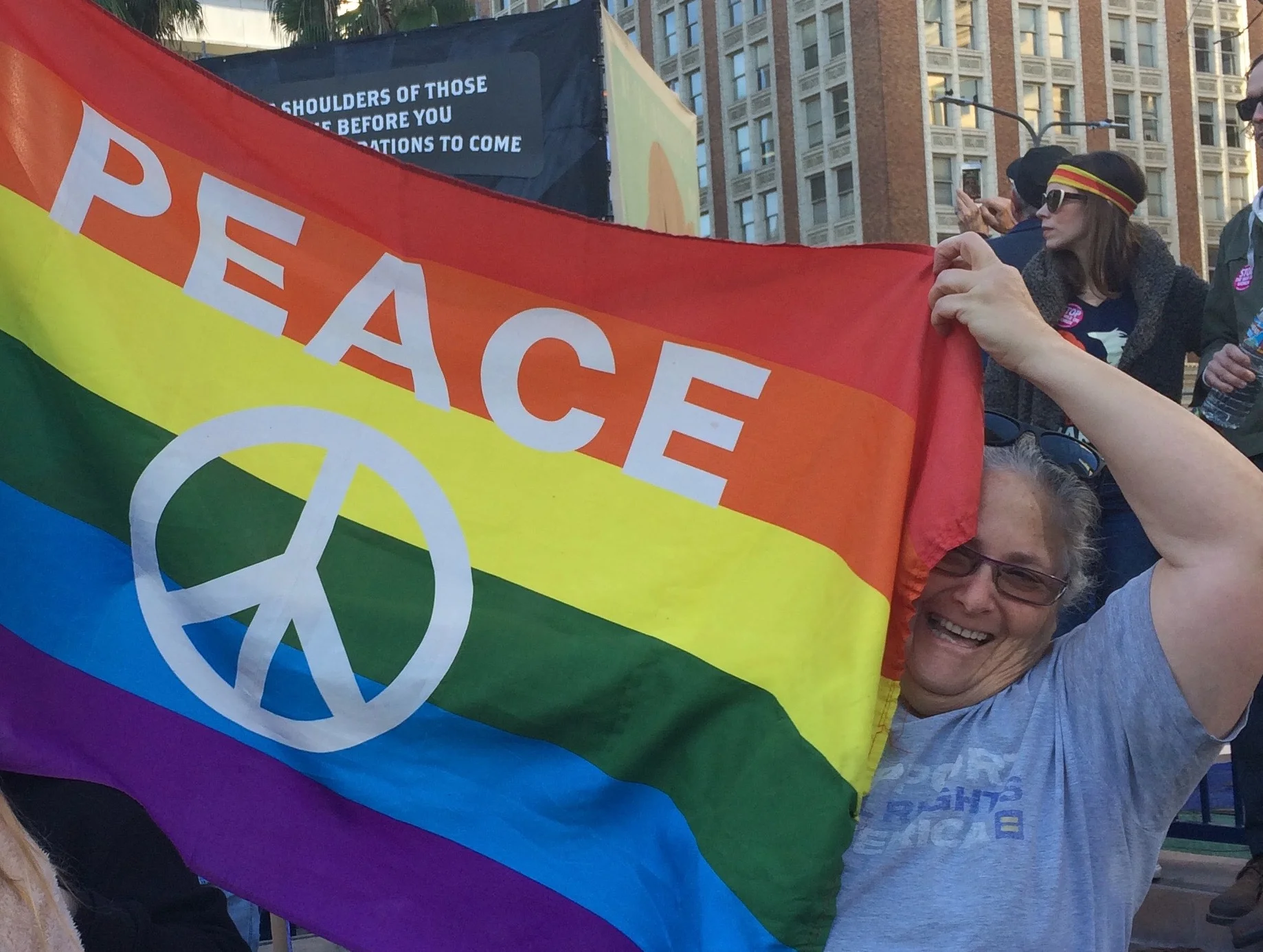 Marcie Kraft, all smiles on the morning of January 21st at Pershing Square. (Photo by Loud Owl)