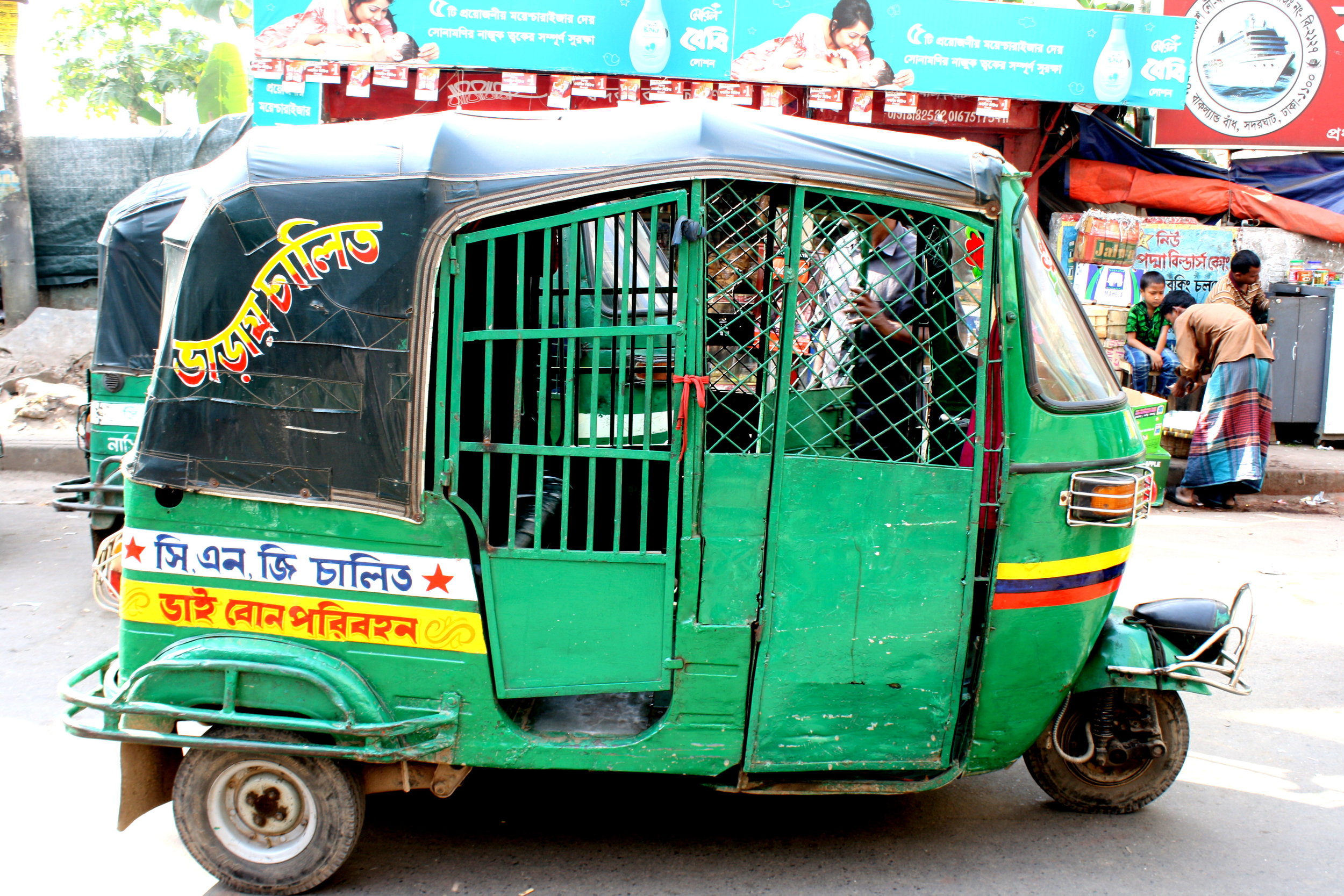  Credit:&nbsp;https://beardedvagabond.wordpress.com/2013/01/10/dhaka-the-heart-of-madness/baby-taxi-cng-dhaka/ 