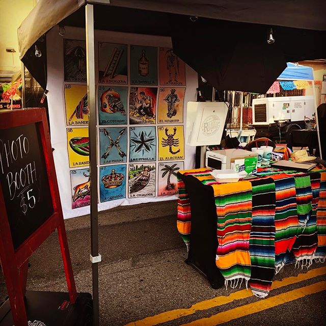 Our booth at last weeks @wilmingtonartwalk event with our new #loter&iacute;a backdrop!