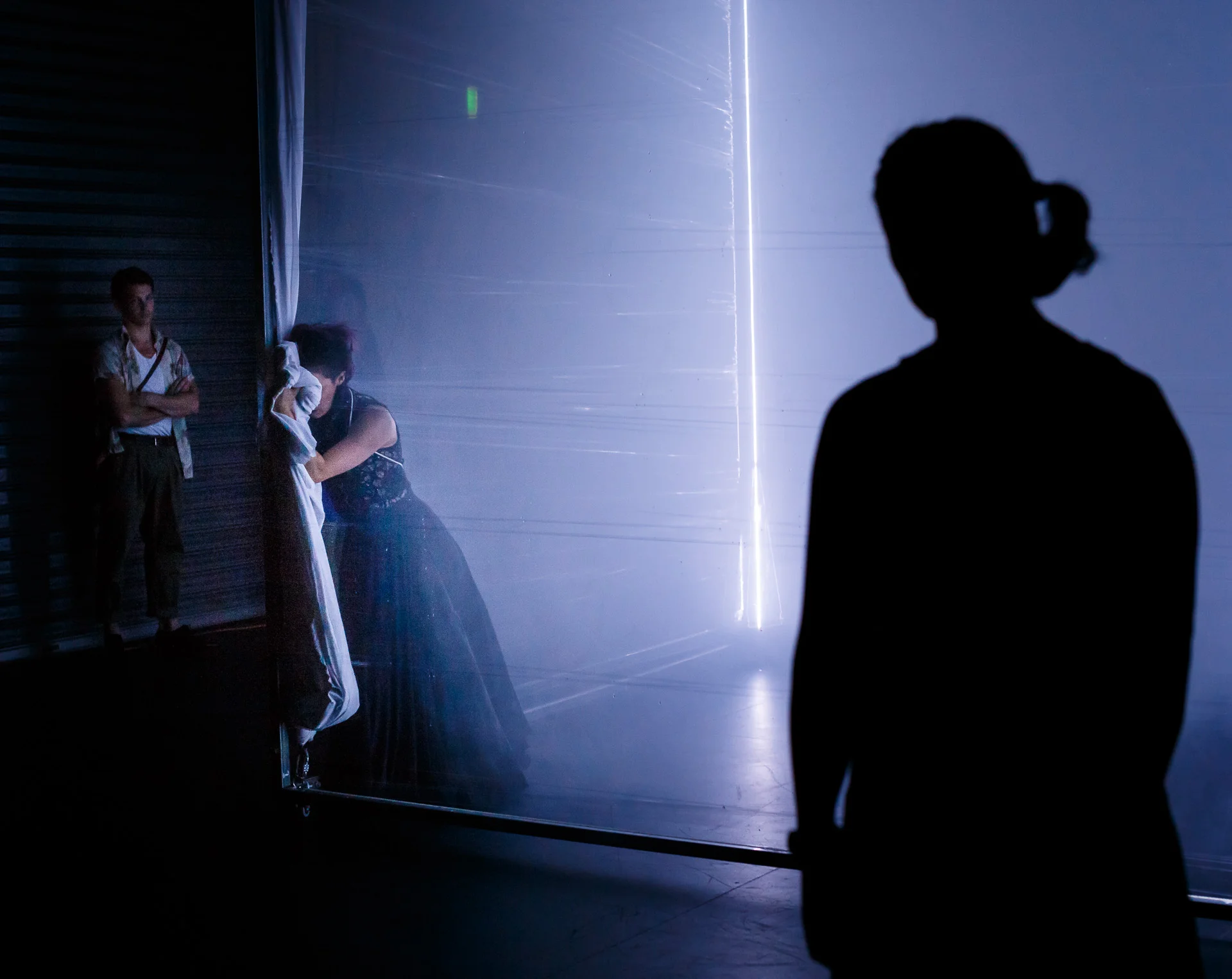 Picture : Alex Mizzen in the 3m x 3m cube, watched by members of the 132th May 2018 audience ( Invisible Things ). Picture credit: Geoff Lawrence, Creative Futures Photography