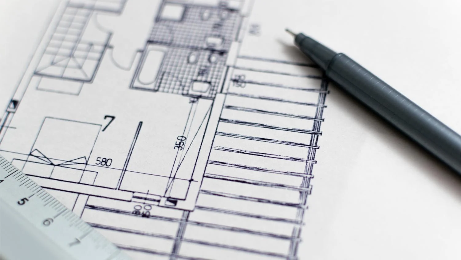 Architecture blueprint with pen and ruler