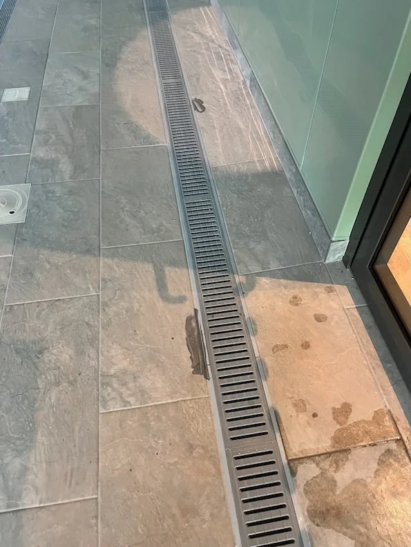 Malvern Builders Clean grout in pool area tiles.jpg