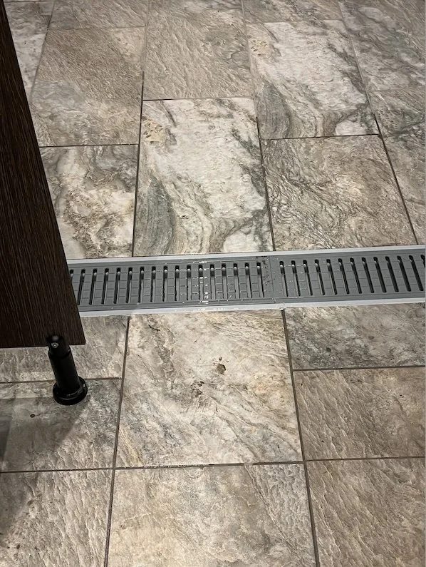 Builders clean drainage chaning room.jpg
