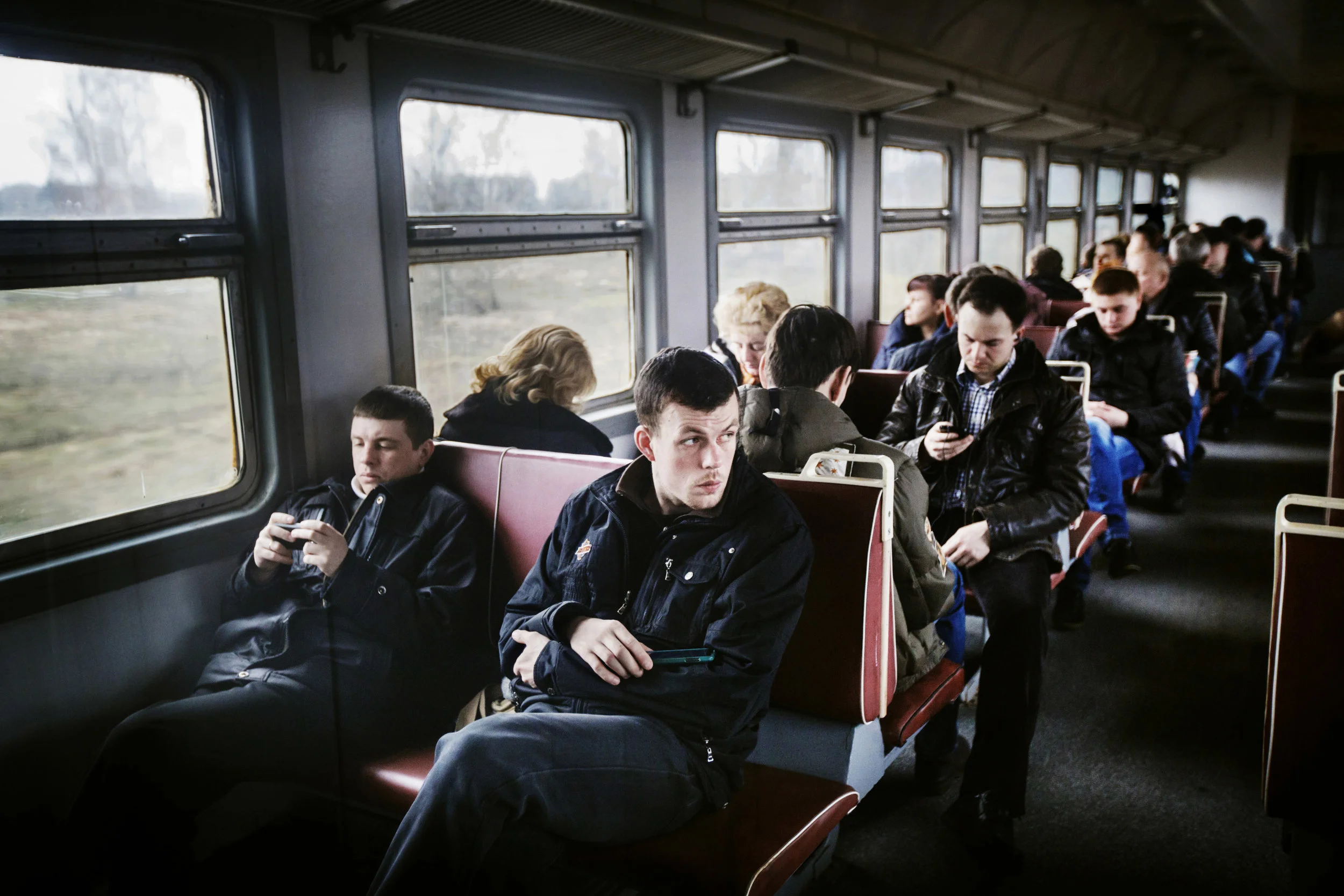  Artëm Vasilec, 27, on his daily commute to Chernobyl. He works on the construction of the sarcophagus, which is being built to prevent radiation from leaking out. Artëm lives in Slavutych, 40km east of Chernobyl, together with his family. Like most 