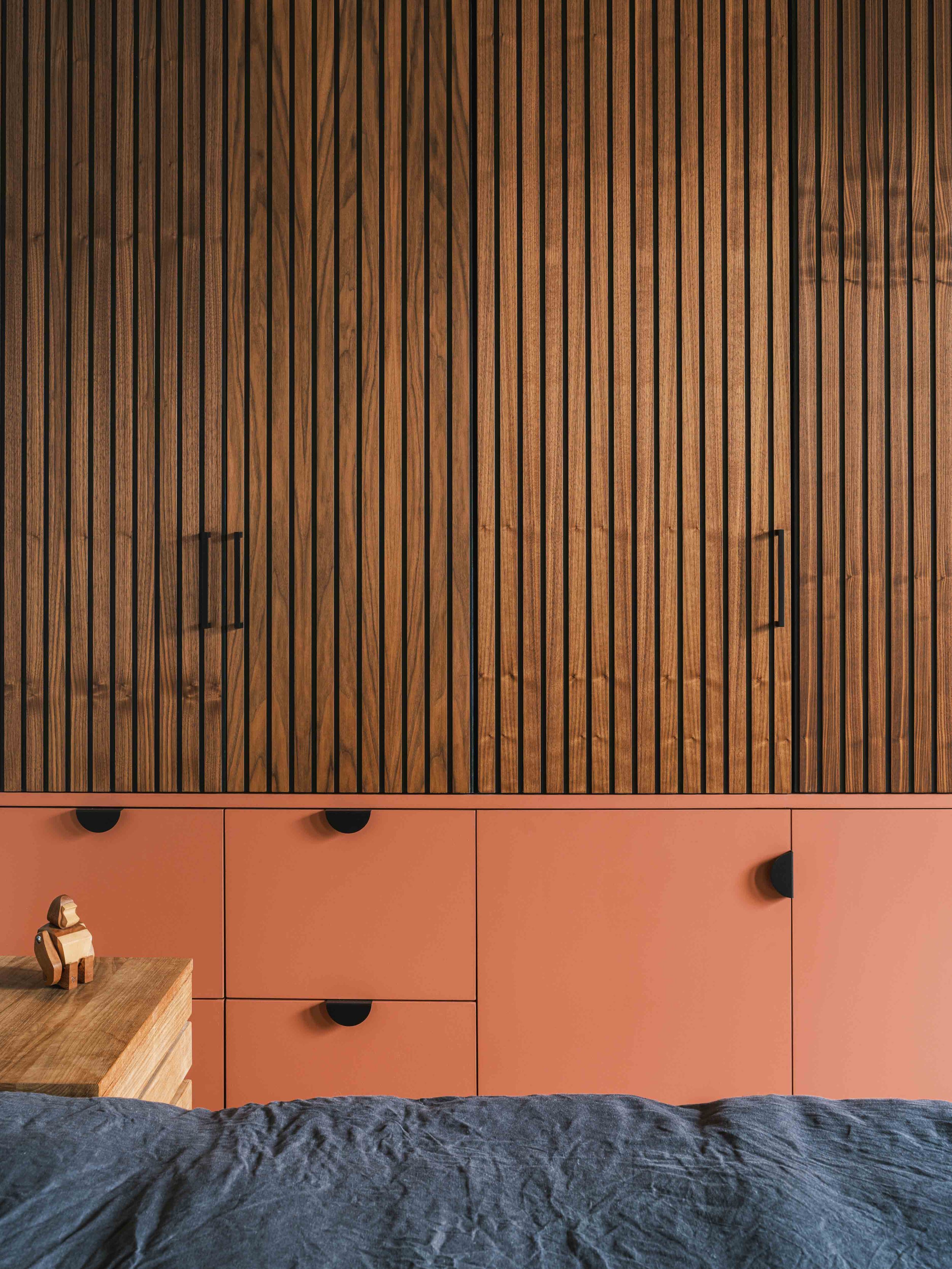 Walnut and terracotta joinery