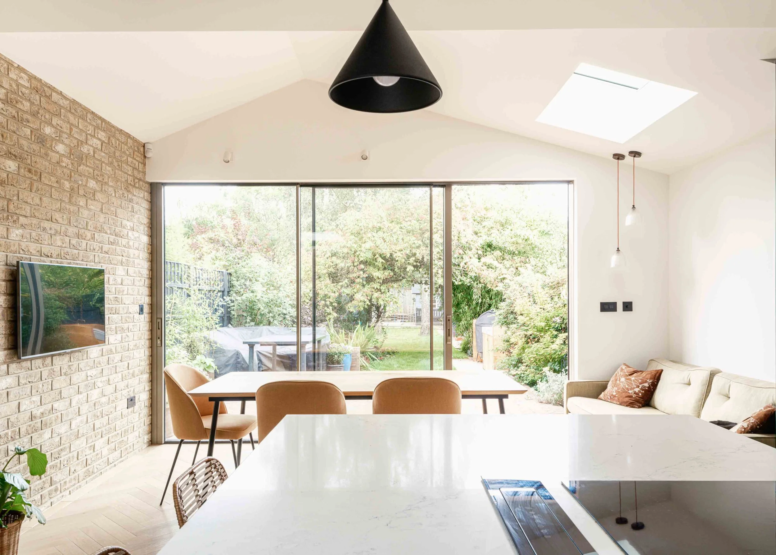 Light filled vaulted kitchen extension with exposed brickwork
