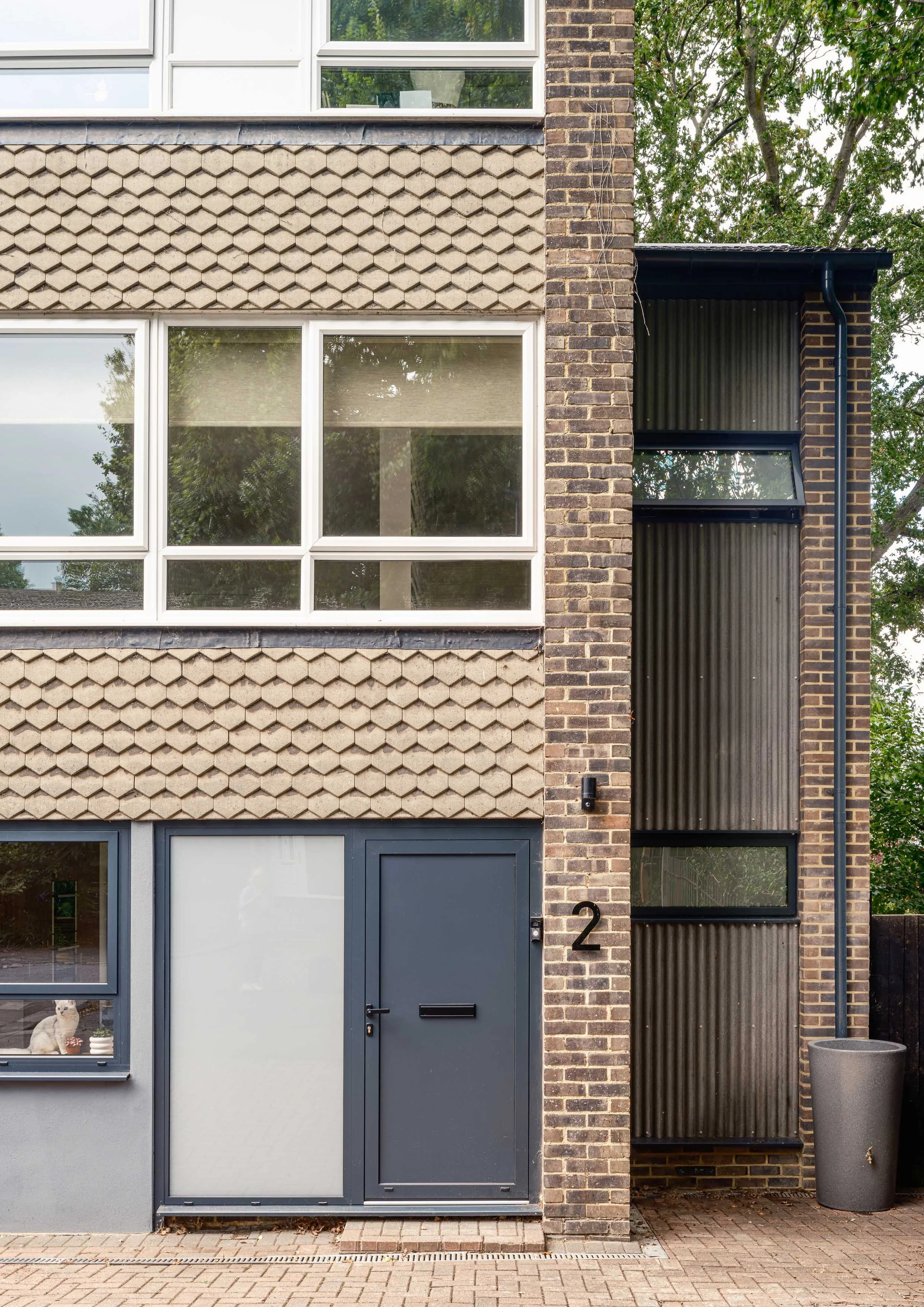Two storey extension with cladding in Crystal Palace