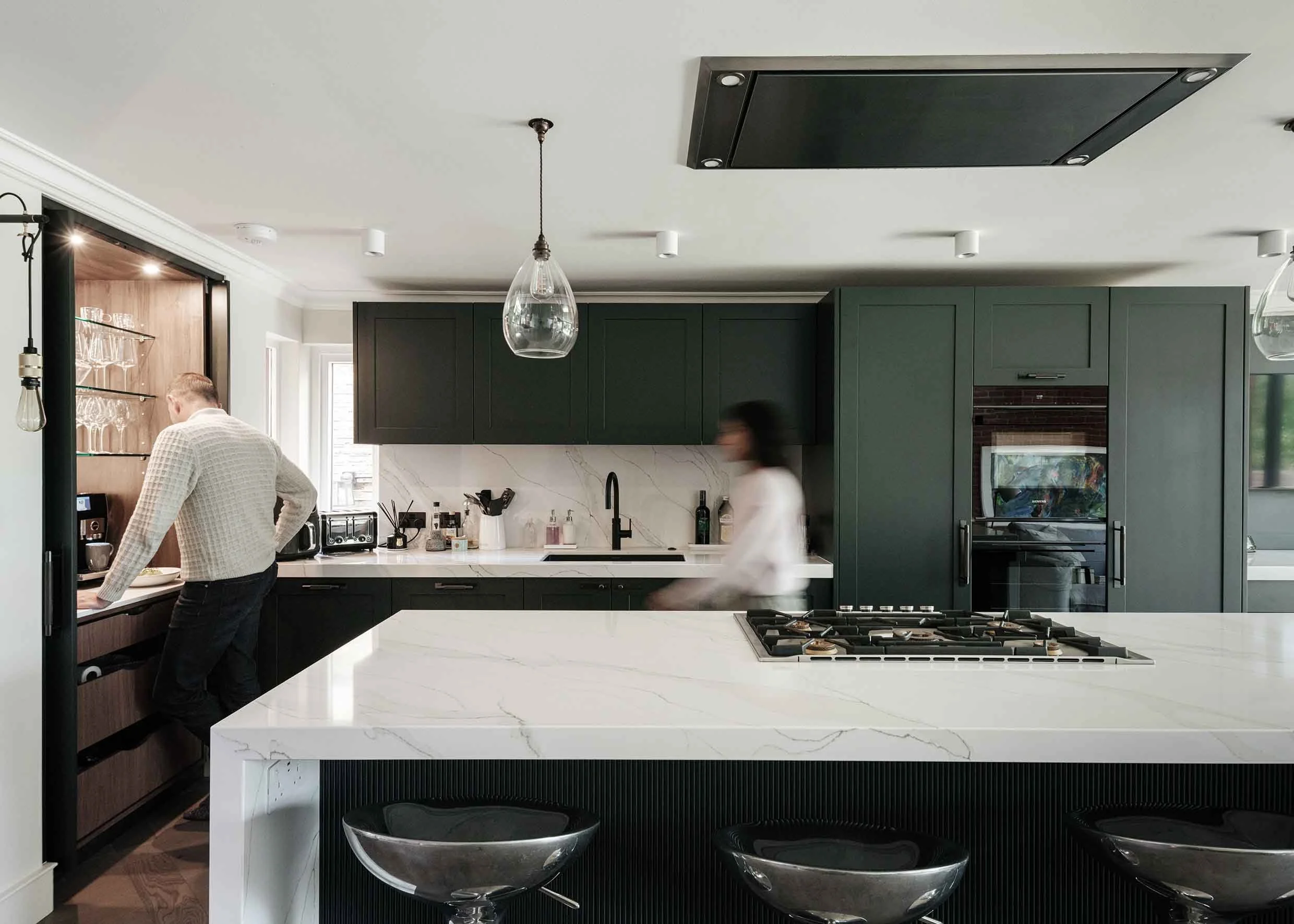 Beautiful bespoke kitchen with hidden bar