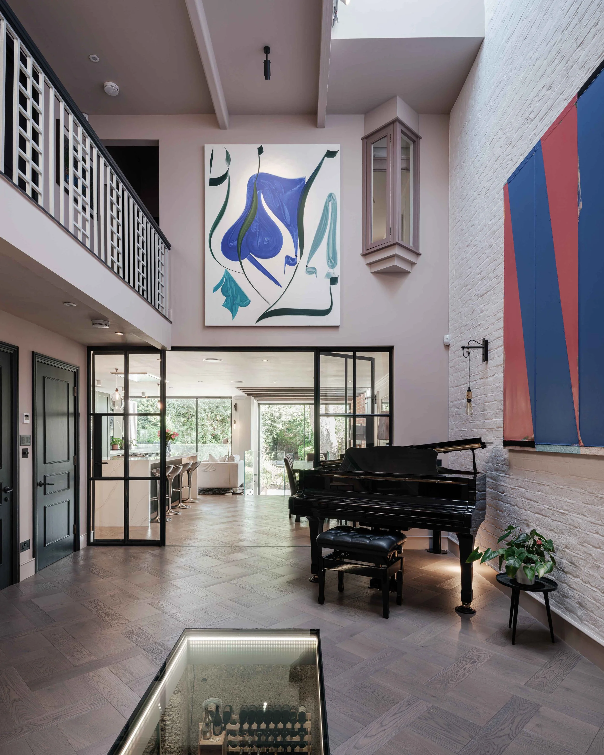 Bright double height hallway transformation