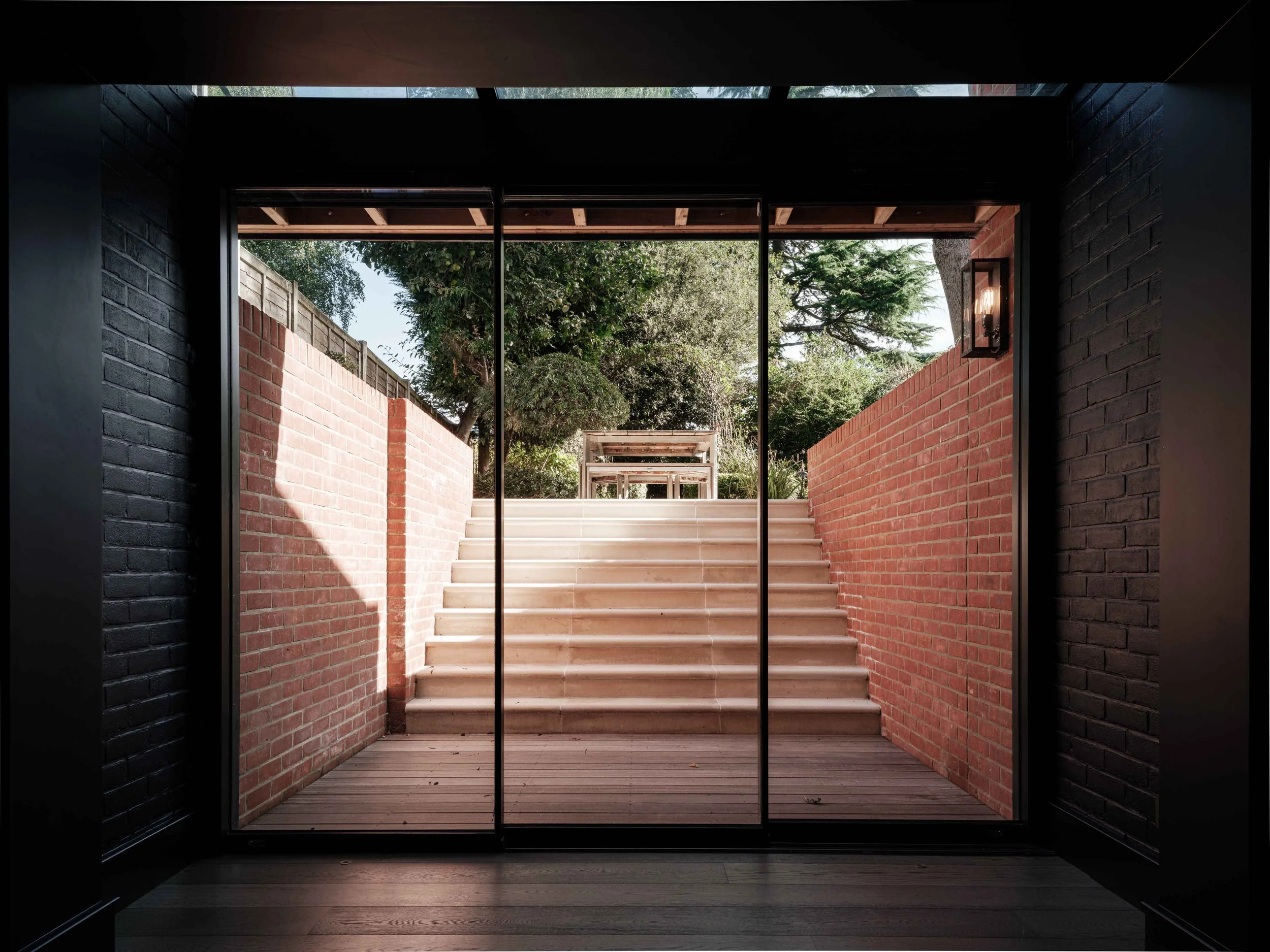 Cinema room with view up stairs to garden