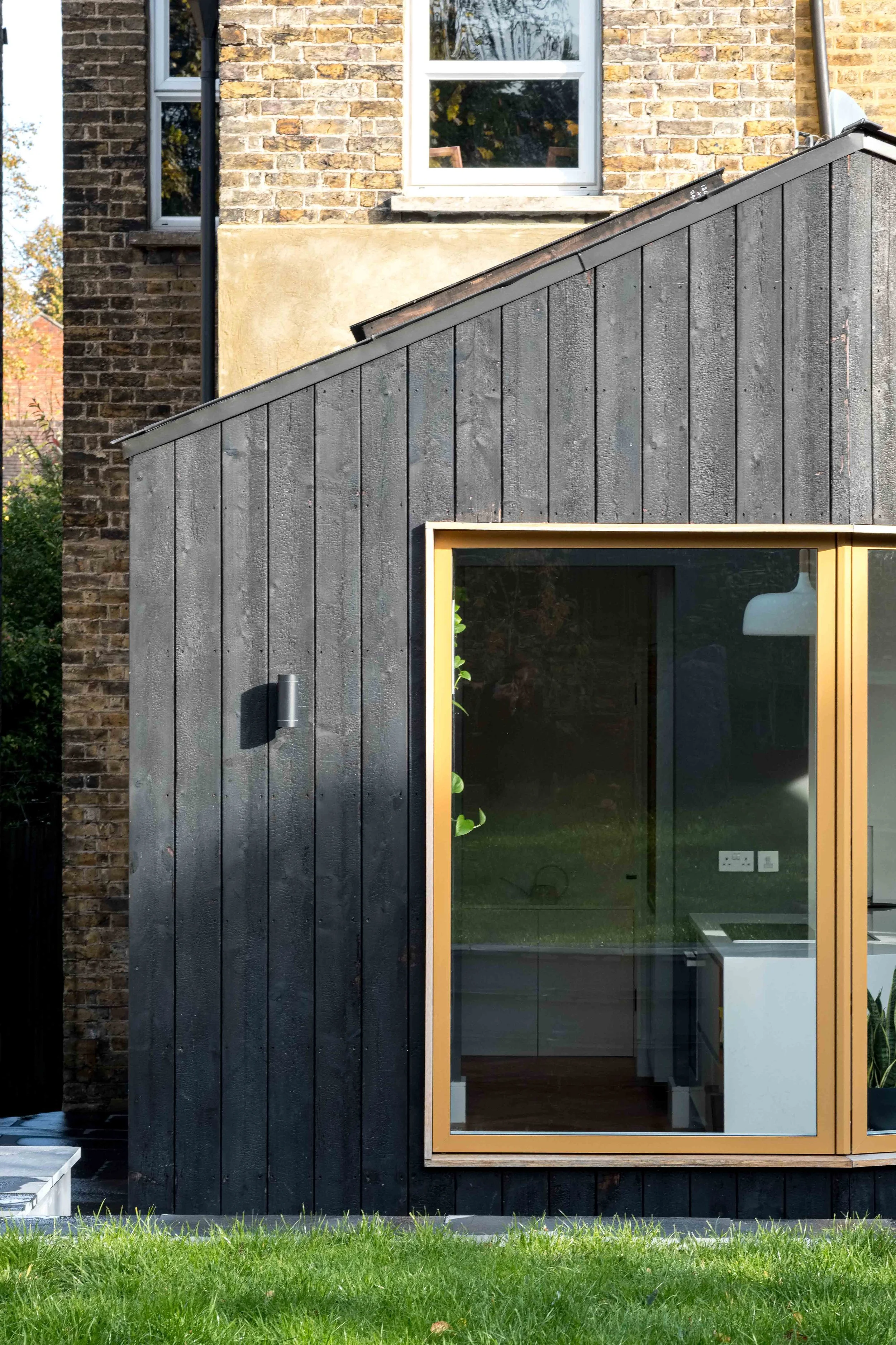 Japanese charred black cladding with oak window