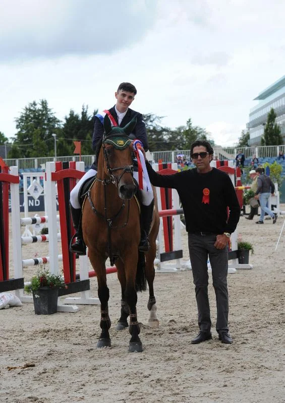 Mark Finnerty and Emma with Michael Meller. - Photo courtesy of the Dublin Horse Show