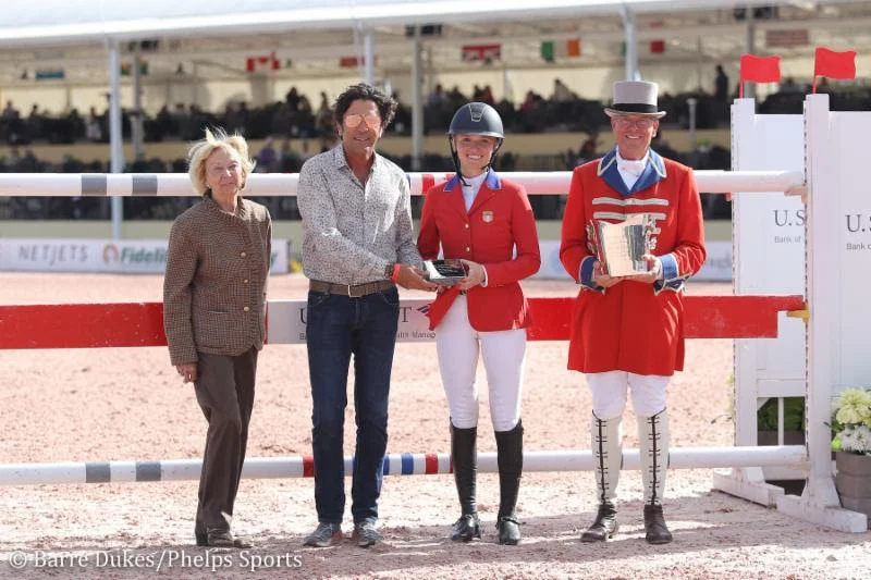 Michael Meller (second from left) presents Lillie Keenan with the M. Michael Meller Style of Riding Award at the Winter Equestrian Festival (WEF).