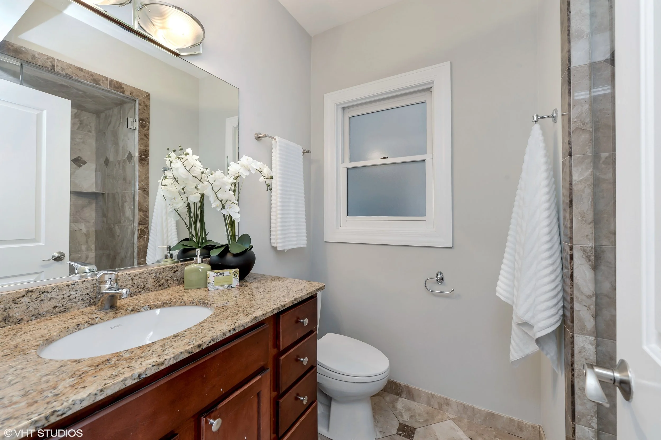 13_942NWoodStreet_Unit1_13_MasterBathroom_HiRes.jpg