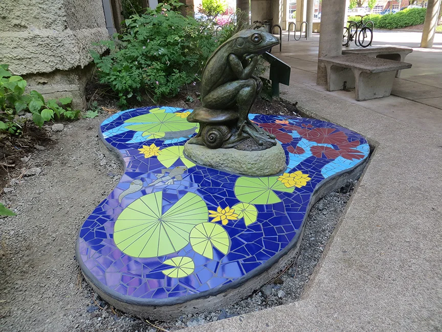 Lily Pond with frog sculpture