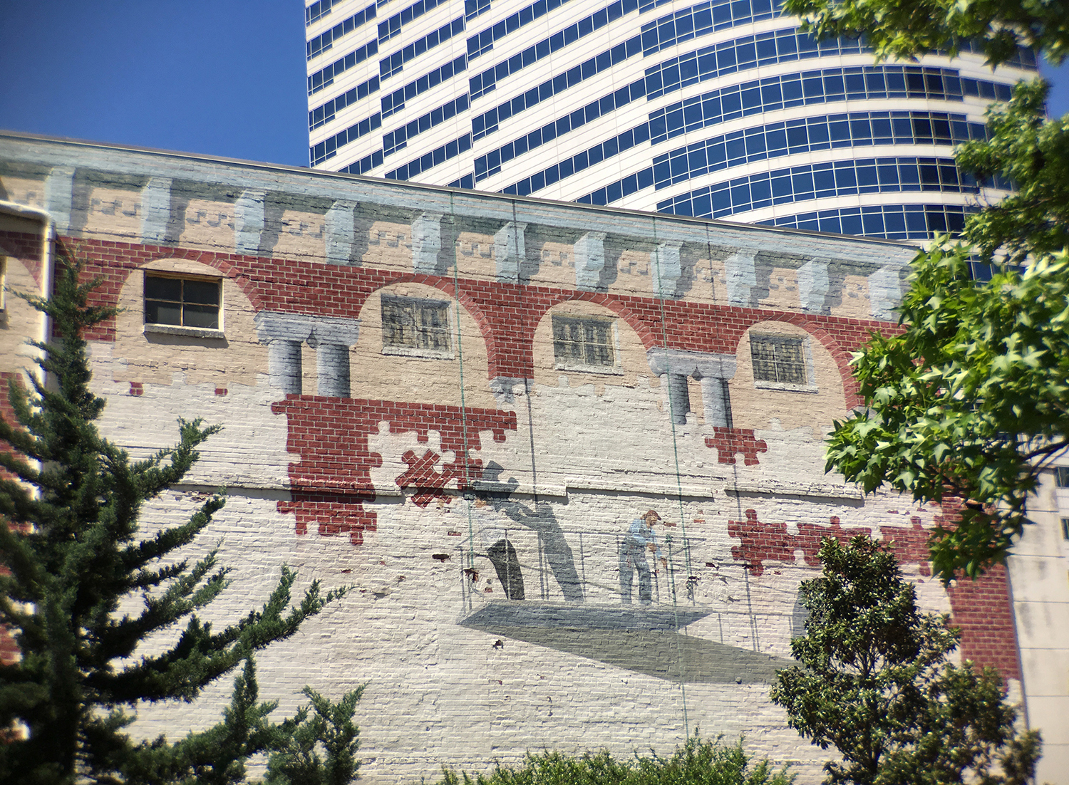  Across from the downtown public library, a trompe l’oeil mural. Those always grab my attention. 