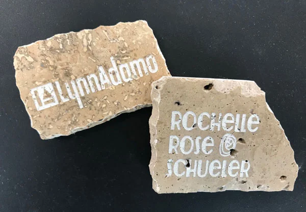 Signature tiles, engraved by Rochelle. The DIY Cave has a machine called a Glow Forge that is attached to a computer and can engrave all sorts of material.