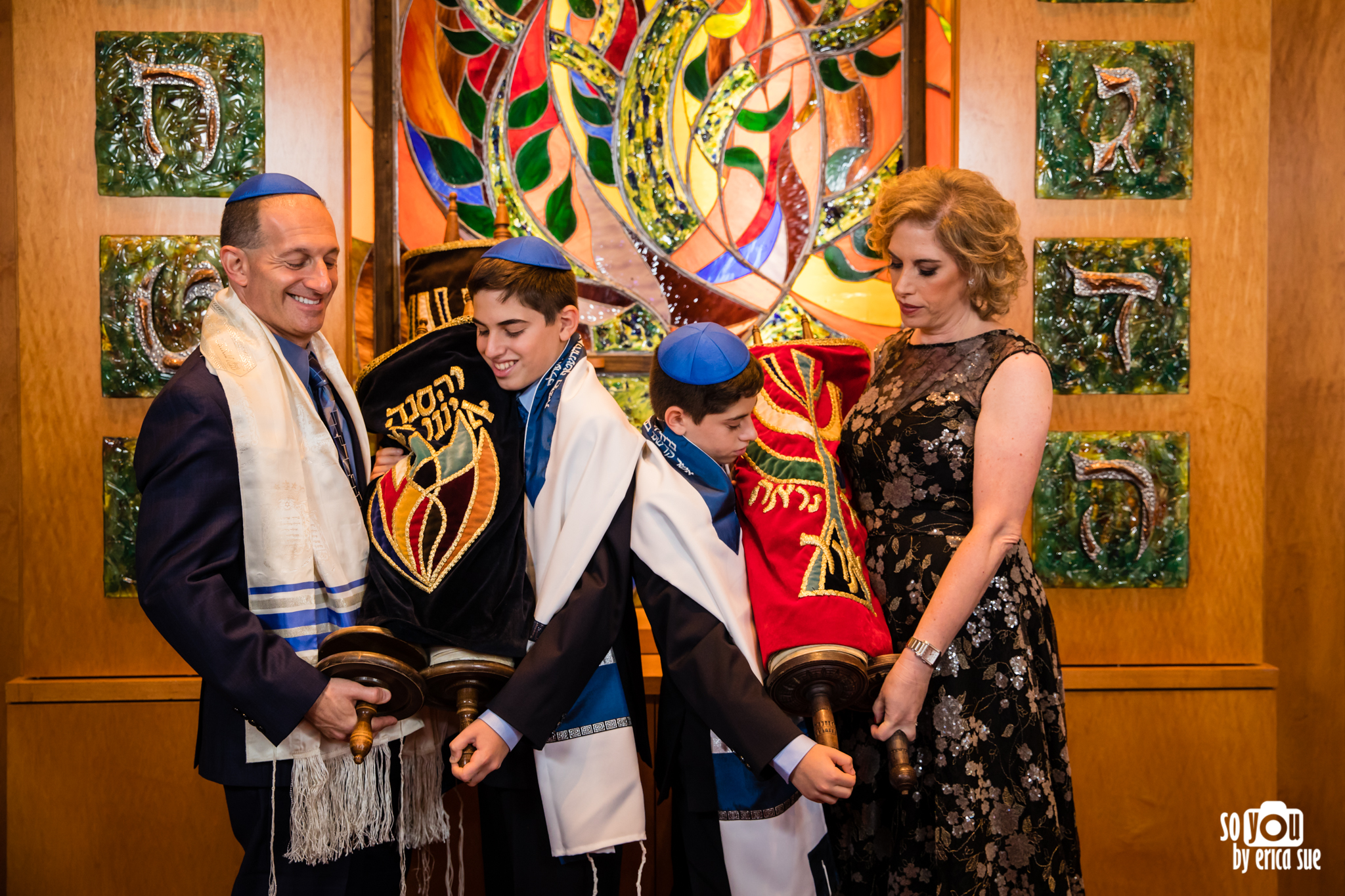 family holding torah