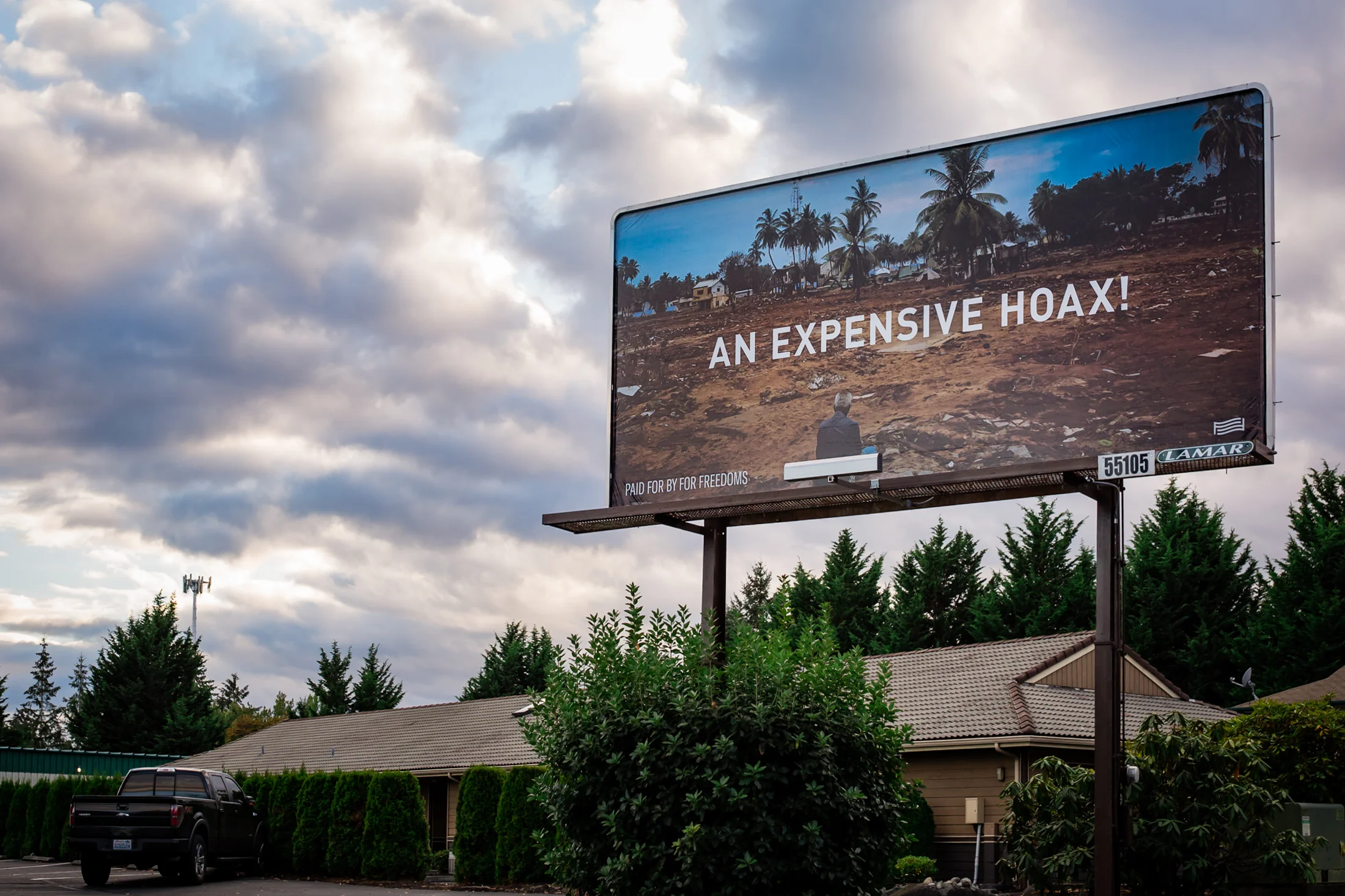 Wyatt Gallery, An Expensive Hoax (billboard), Olympia. WA, 2018. Image courtesy Loewyn Young and For Freedoms.