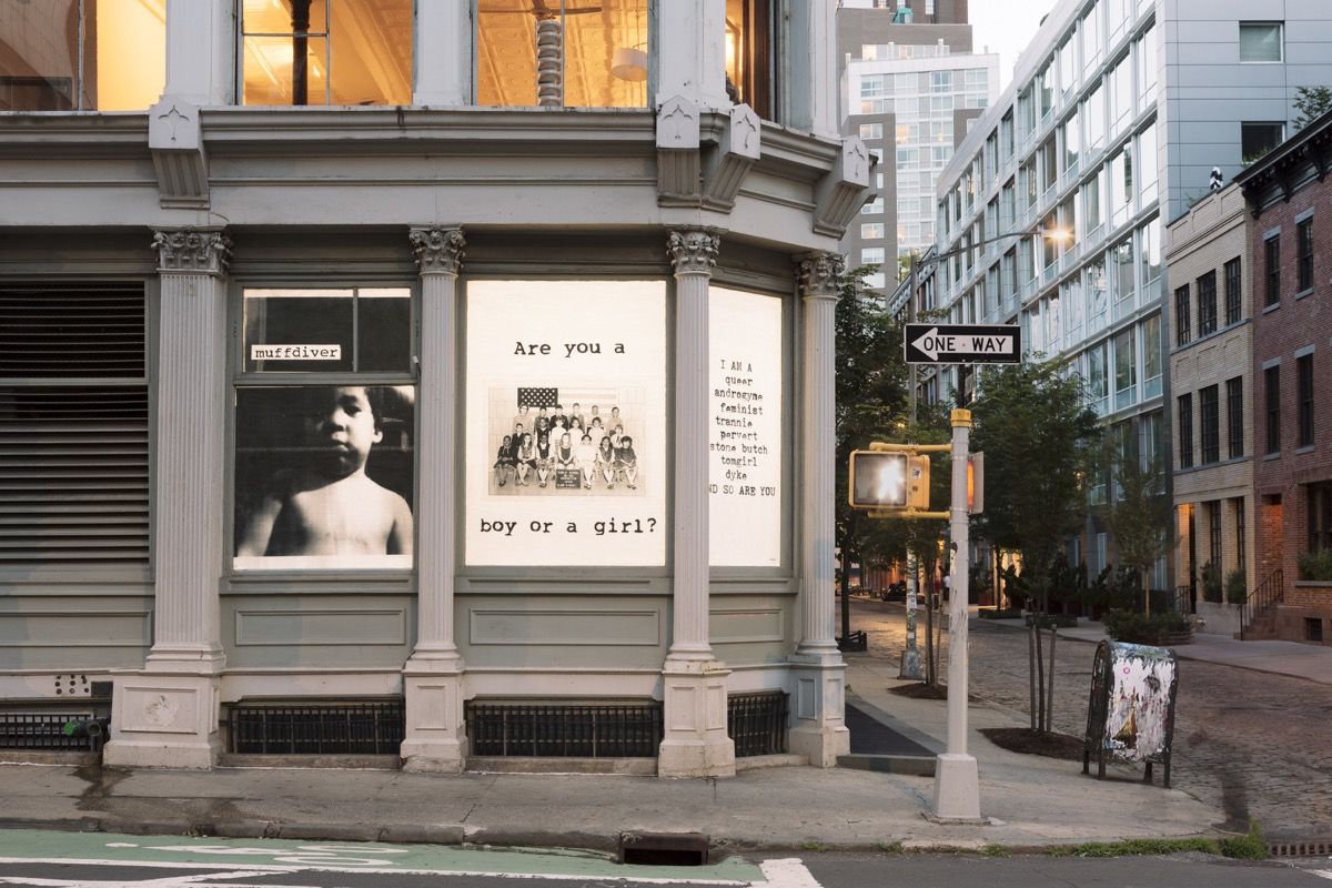 fierce pussy, AND SO ARE YOU ( ink on paper, site-specific window installation) , 1991-2018. Image courtesy Kristine Eudey.