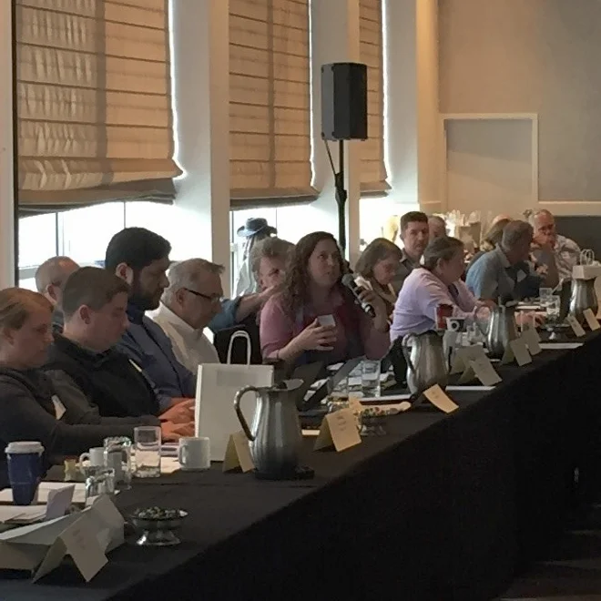 NOC meeting participants discuss ways to strengthen enforcement in the organic dairy sector.