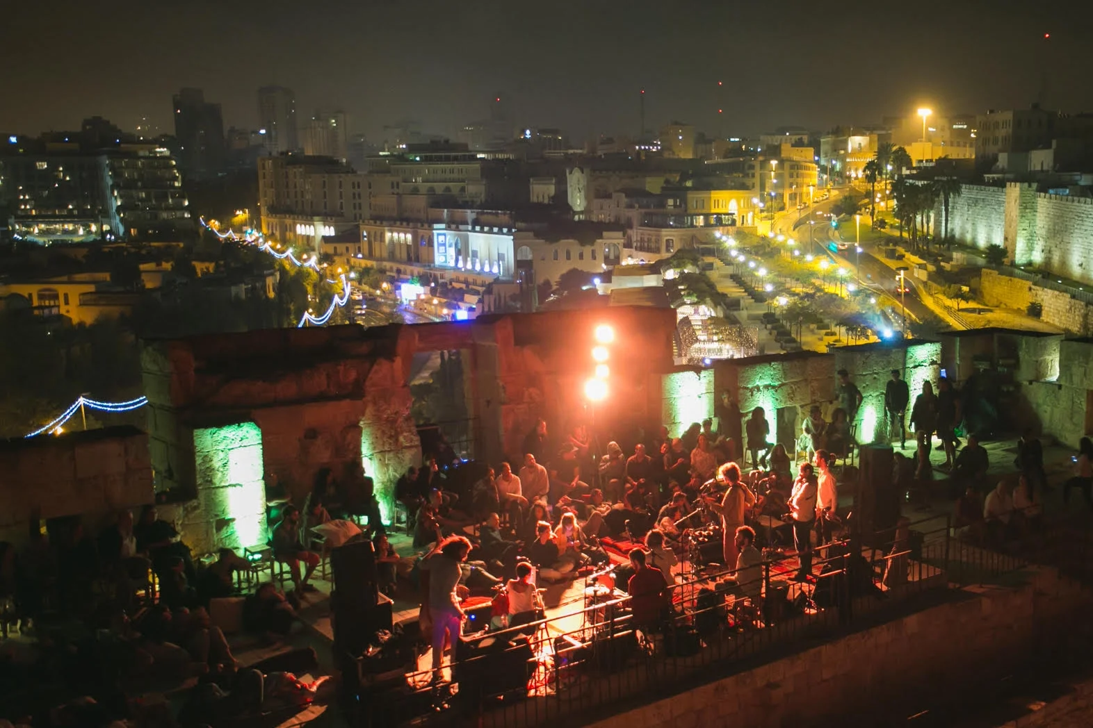 Rooftop performance at the Mekudeshet Festival with downtown Jerusalem in the background
