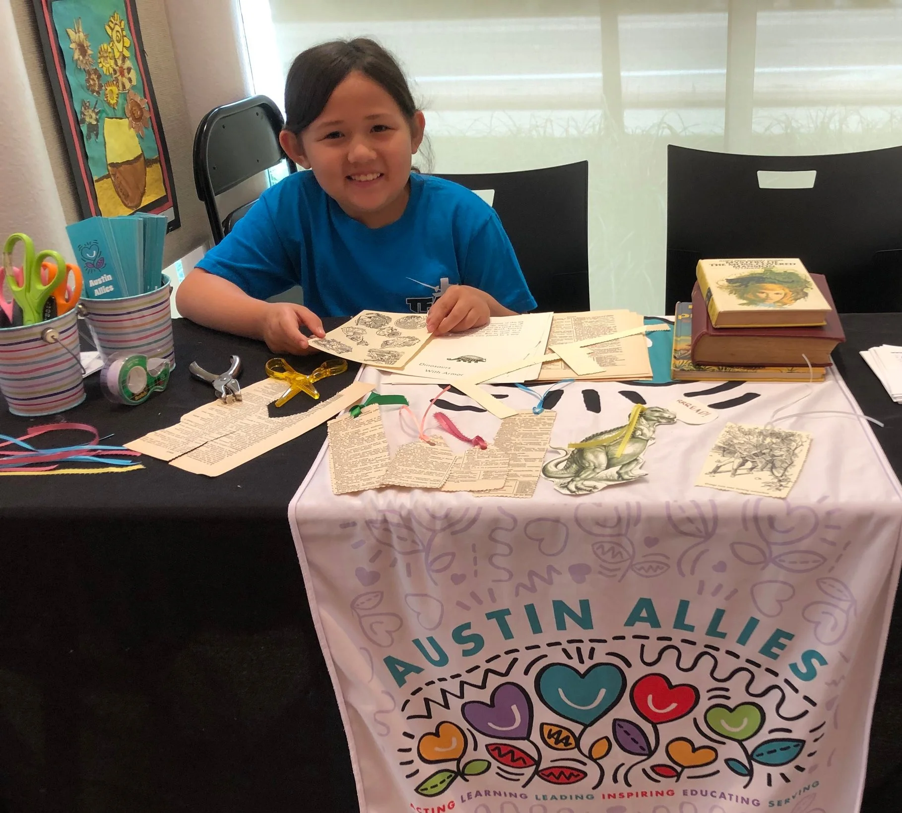Kassie recently helped us run our booth at AISD’s Summer Reading Splash!