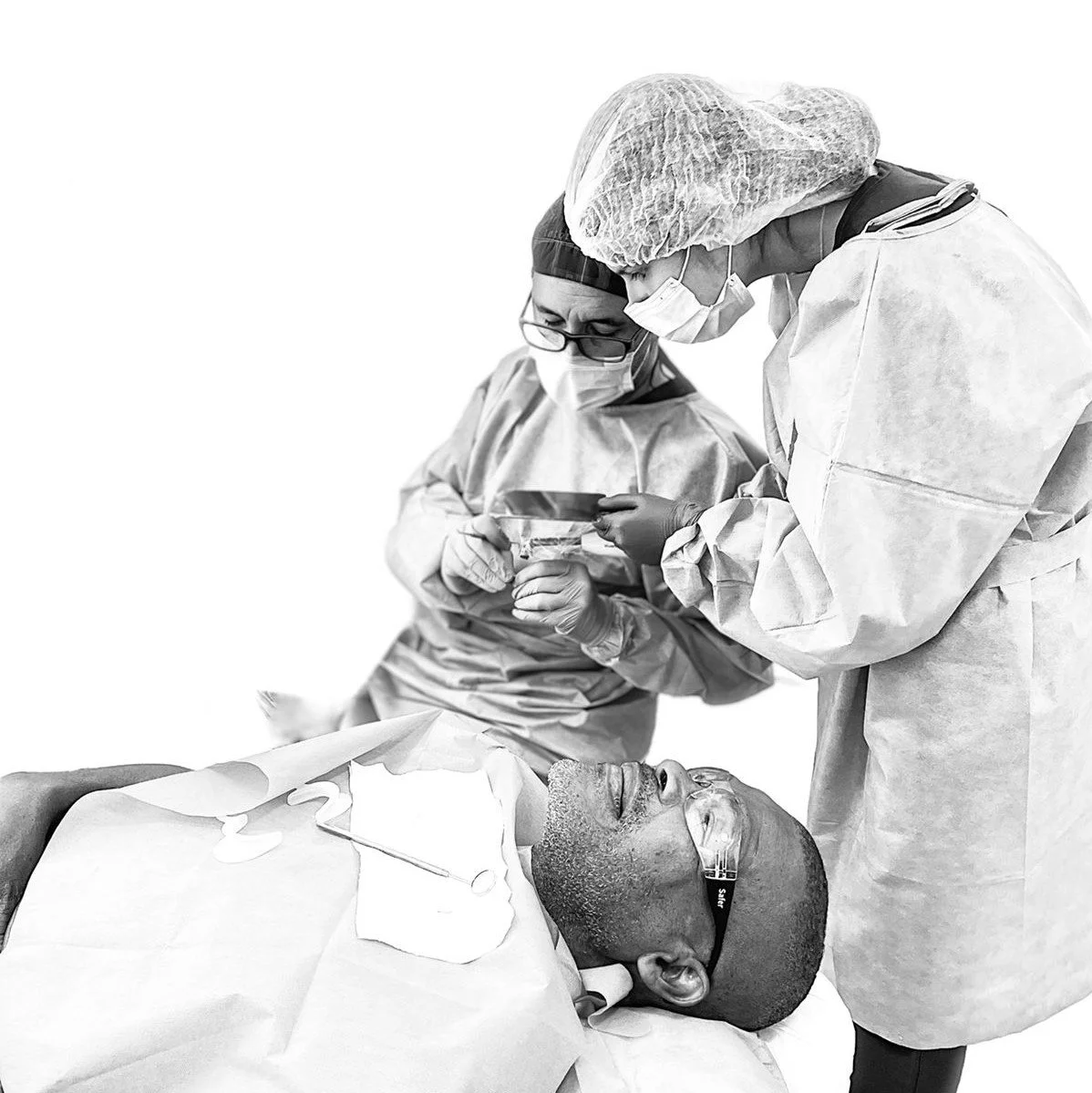Dentist reviewing dental implant treatment plan in Colombia