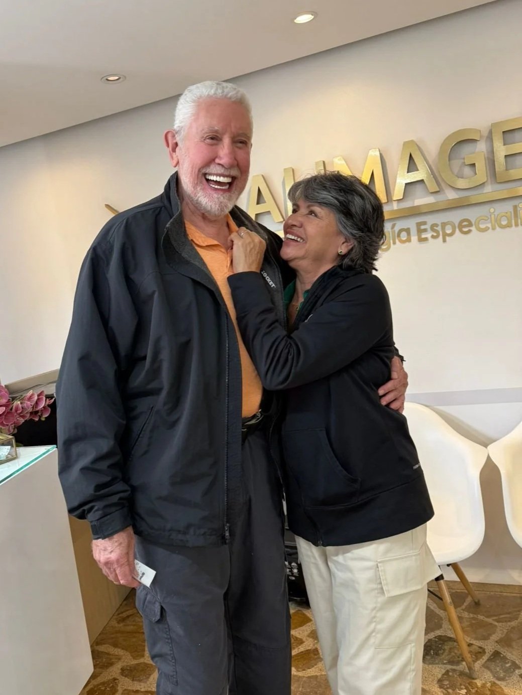 Happy dental implant patient in Medellin, Colombia