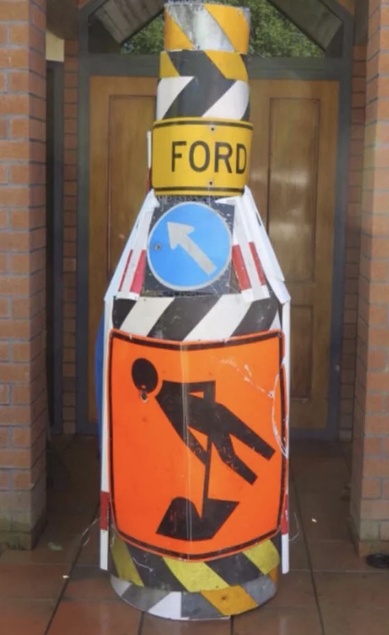 The final artwork created from the mangled local road signs